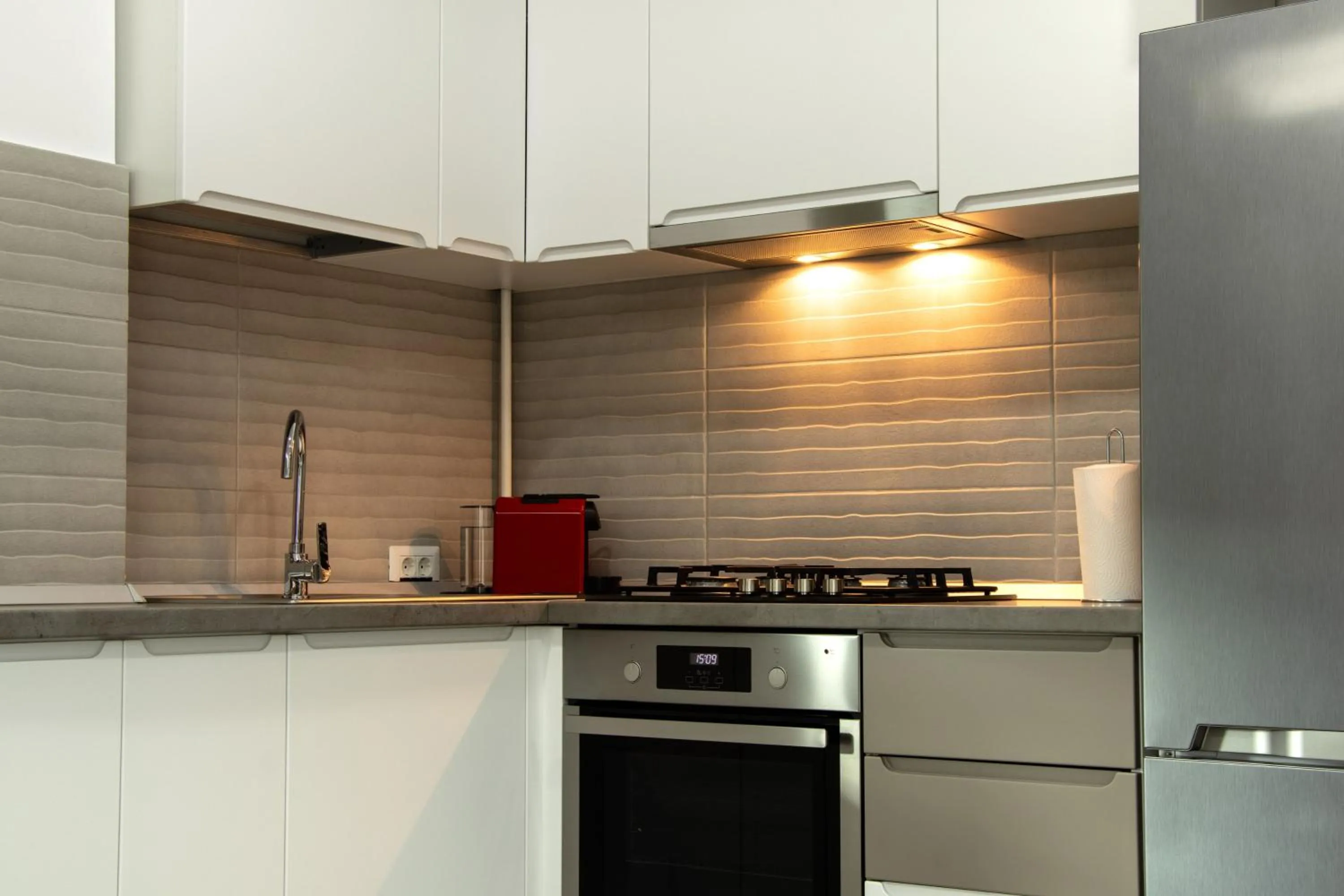 Kitchen or kitchenette in Clement Apartments