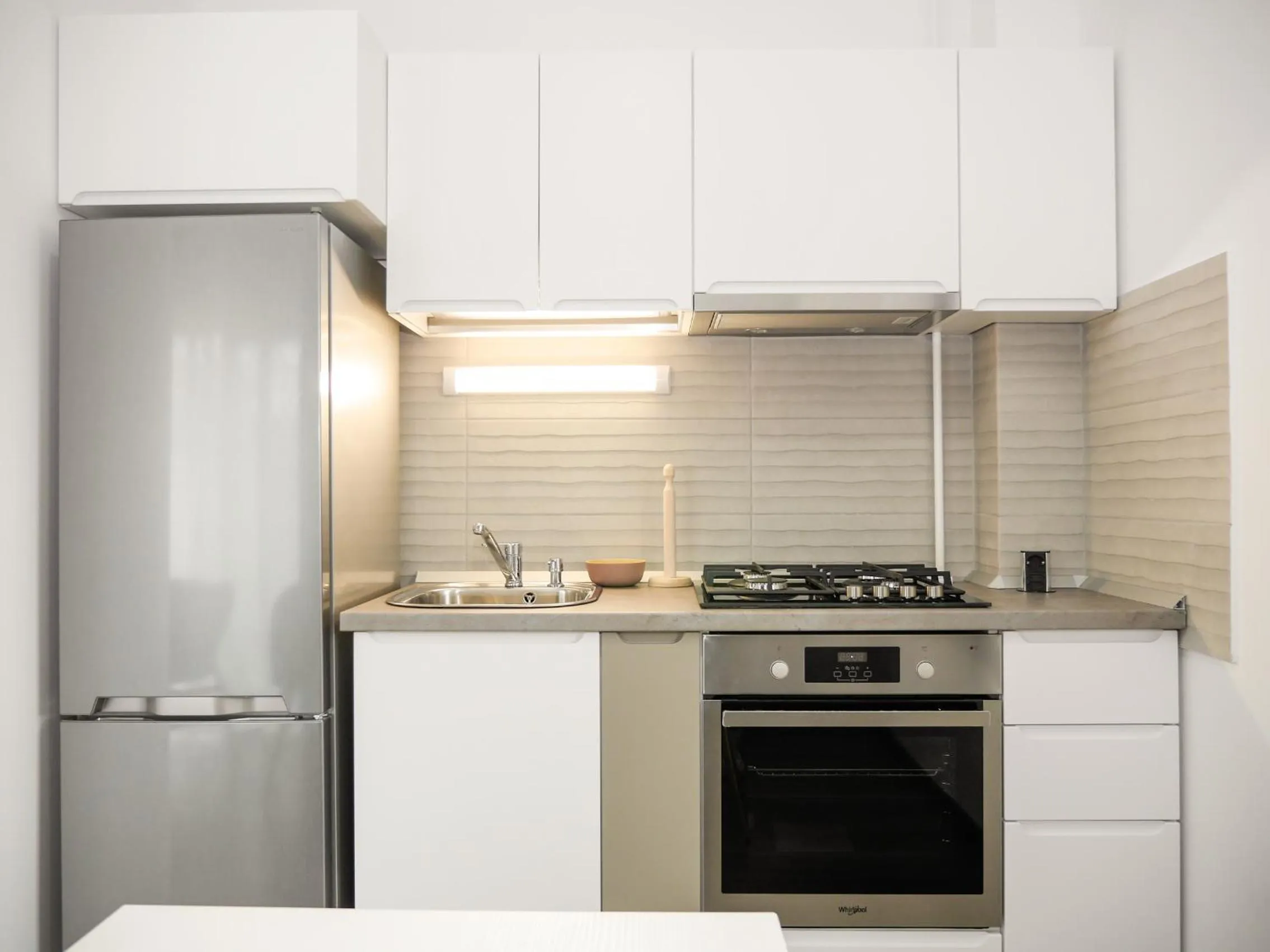 Kitchen or kitchenette in Clement Apartments