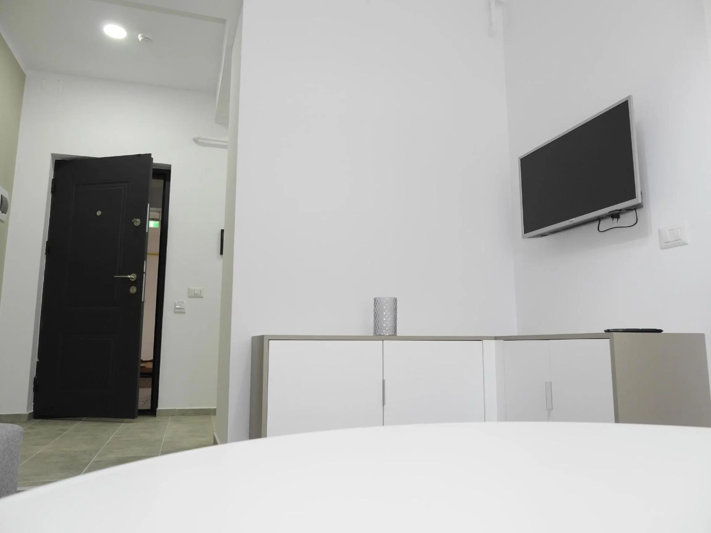 Living room, Bed in Clement Apartments