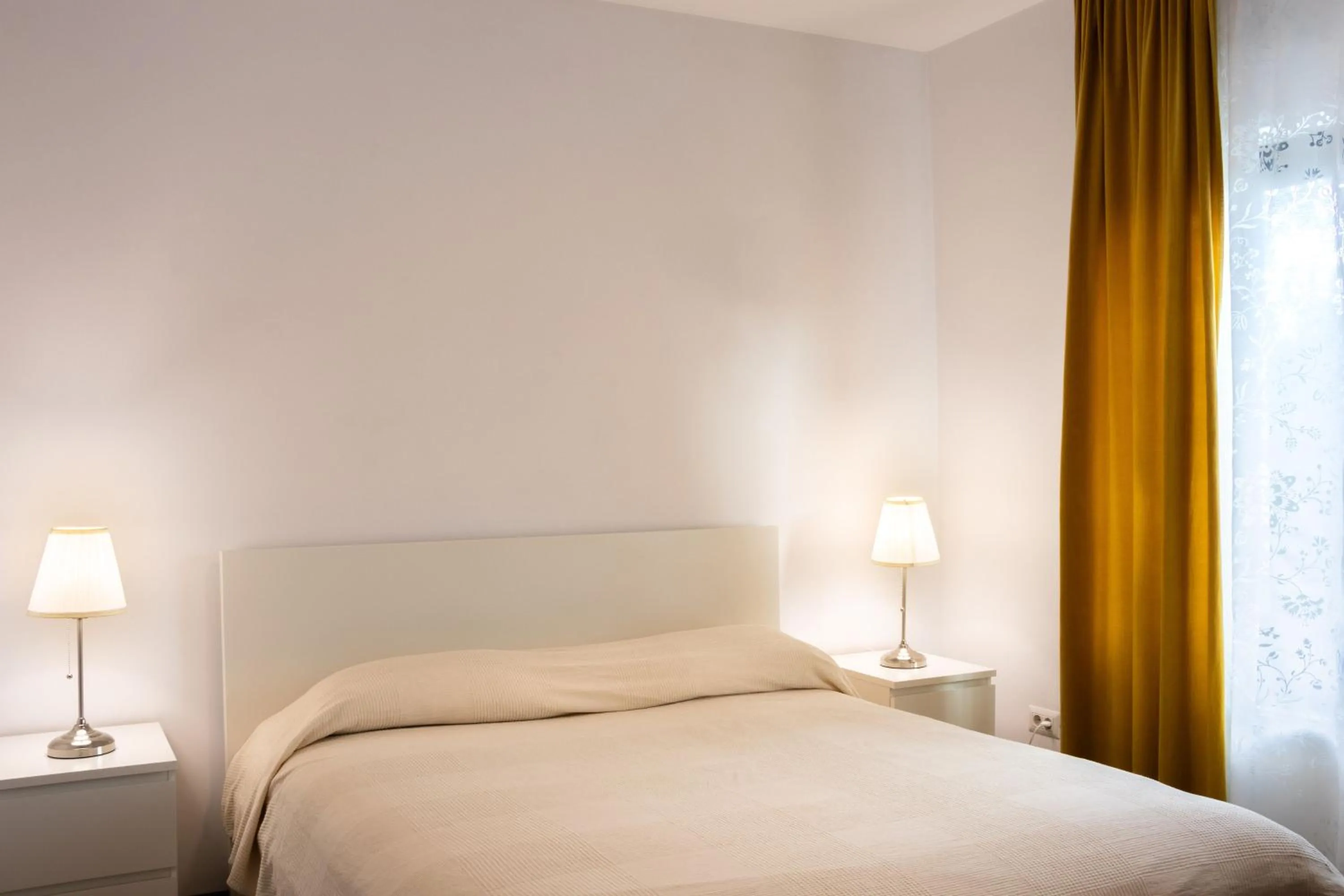 Bed in Clement Apartments