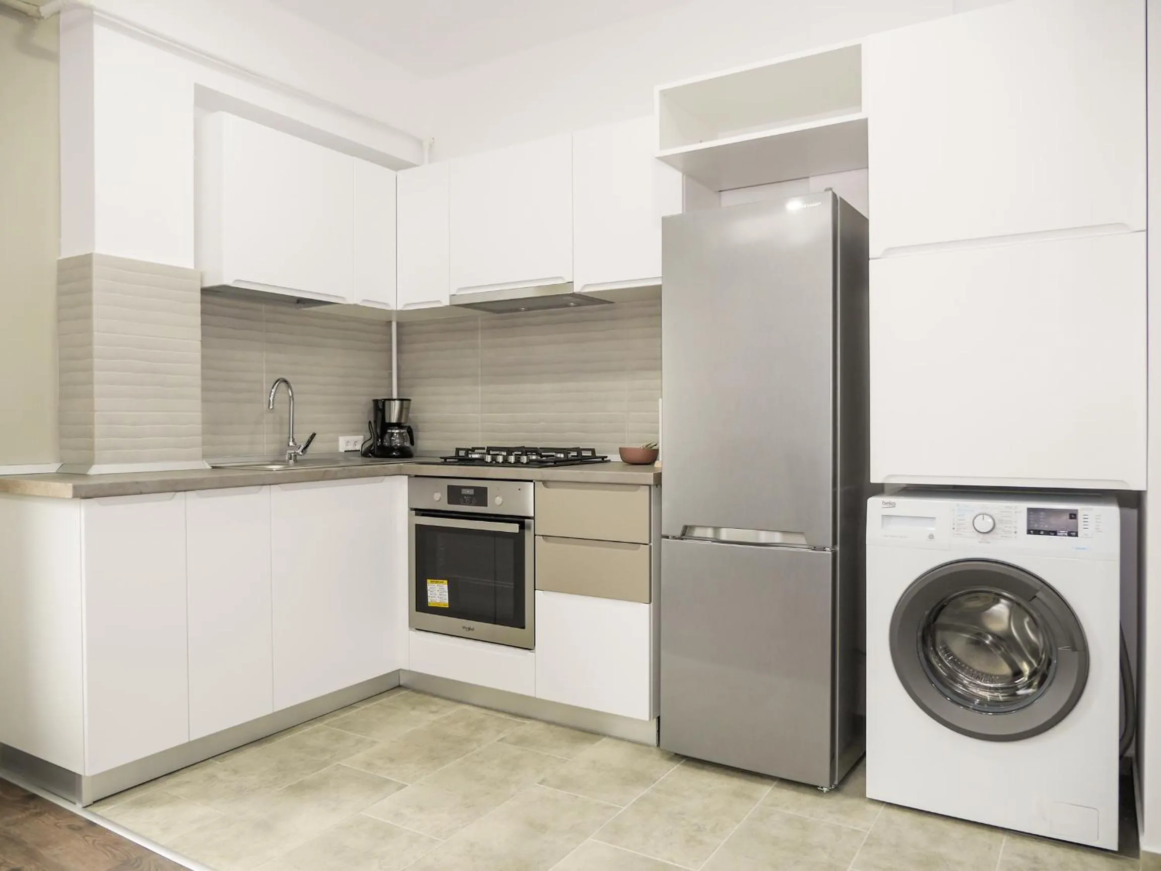 Kitchen or kitchenette in Clement Apartments