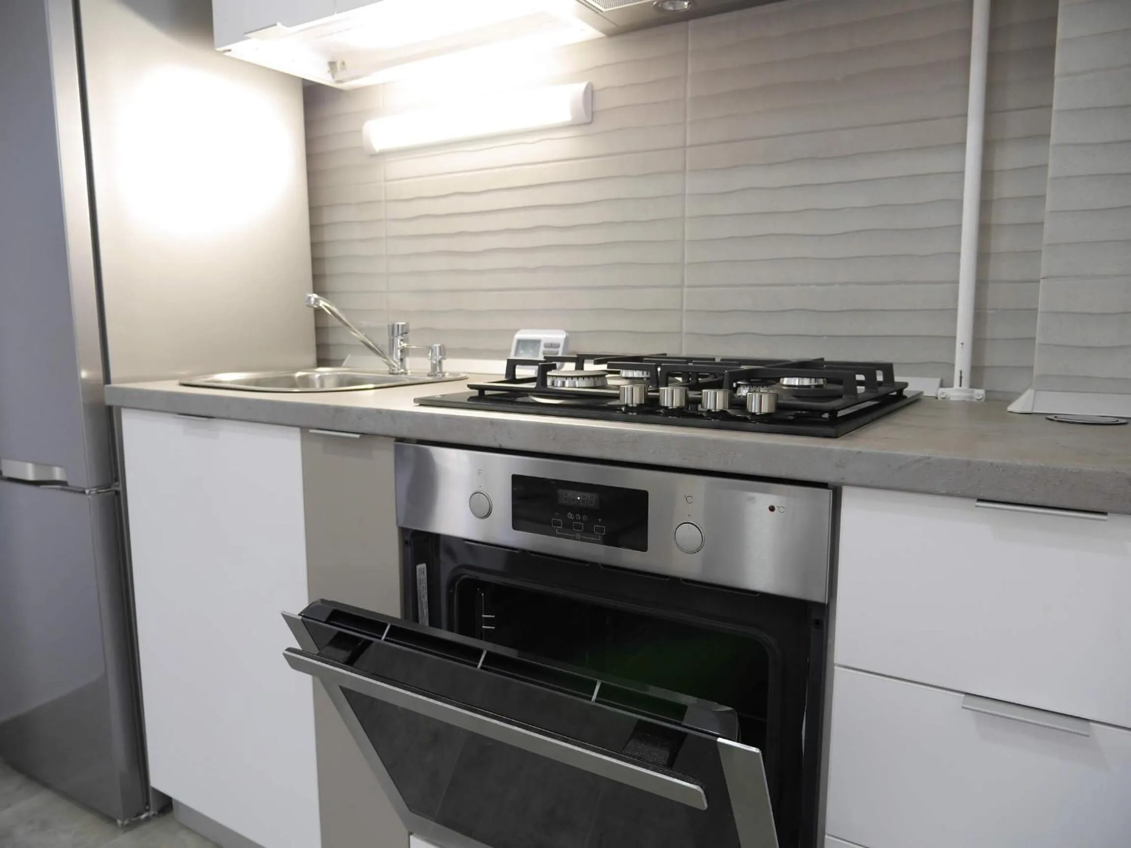 Kitchen or kitchenette in Clement Apartments
