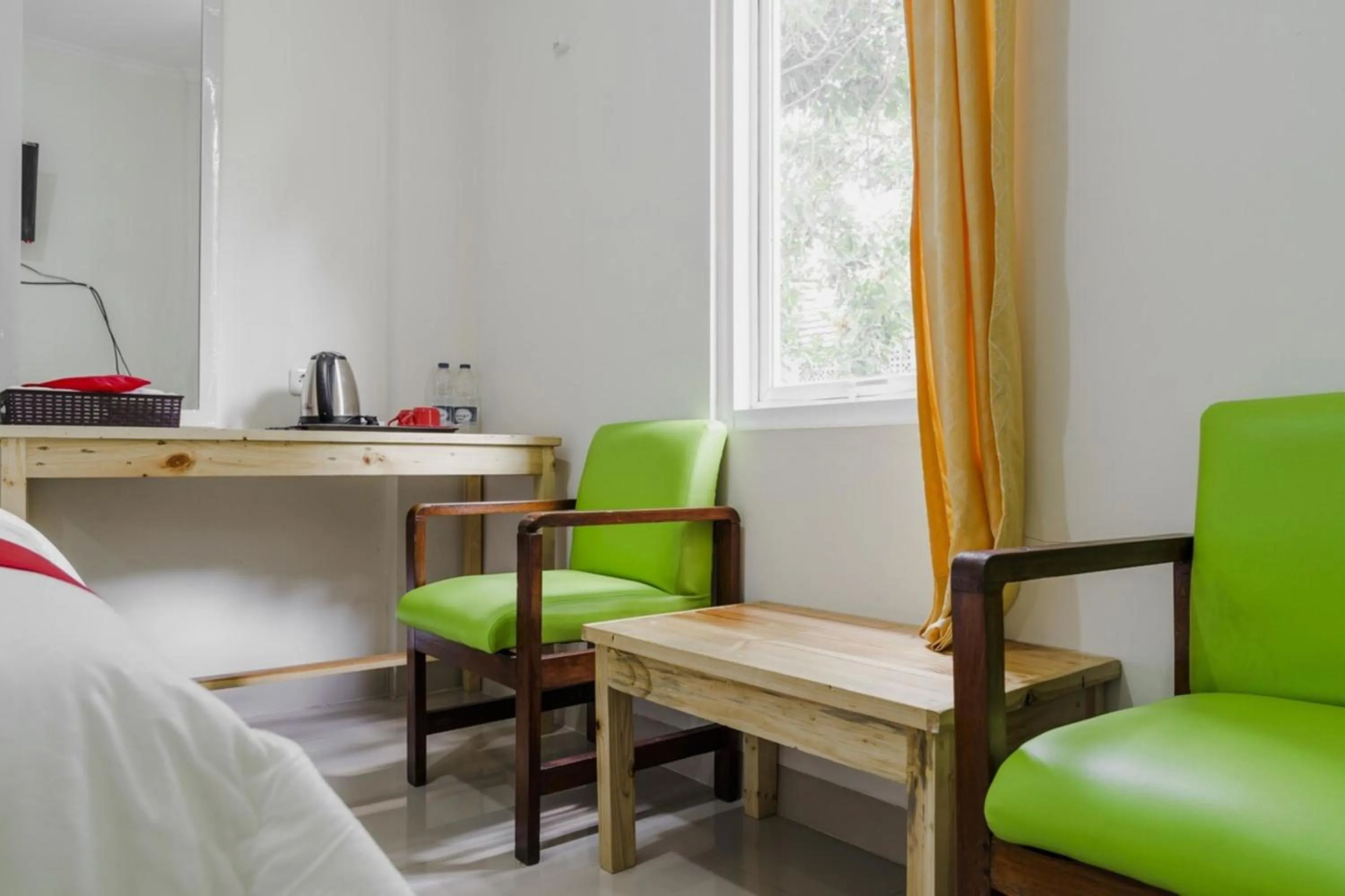 Bed in Urbanview Hotel Minongga Pondok Labu by RedDoorz