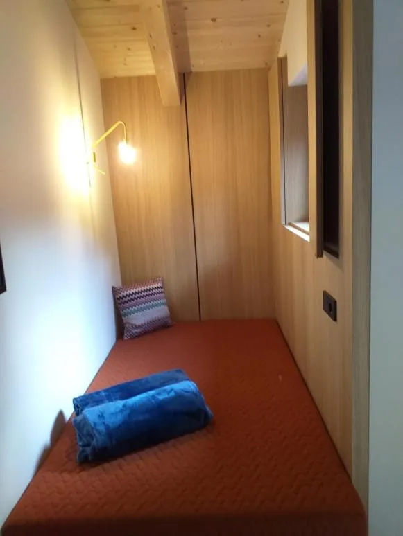 Bed in Hotel Villa Mayr Rooms & Suites