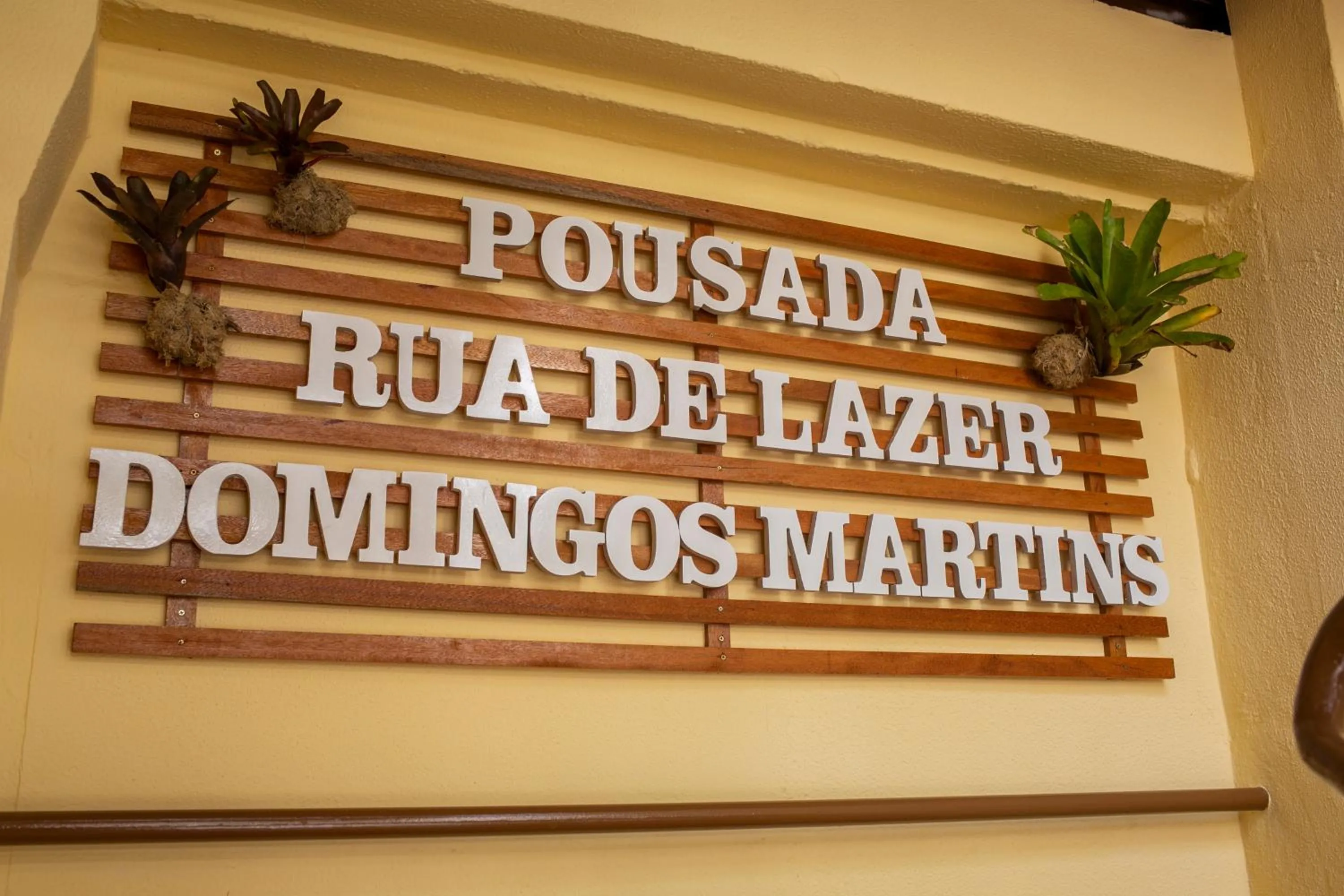 Property logo or sign in Pousada Rua de Lazer