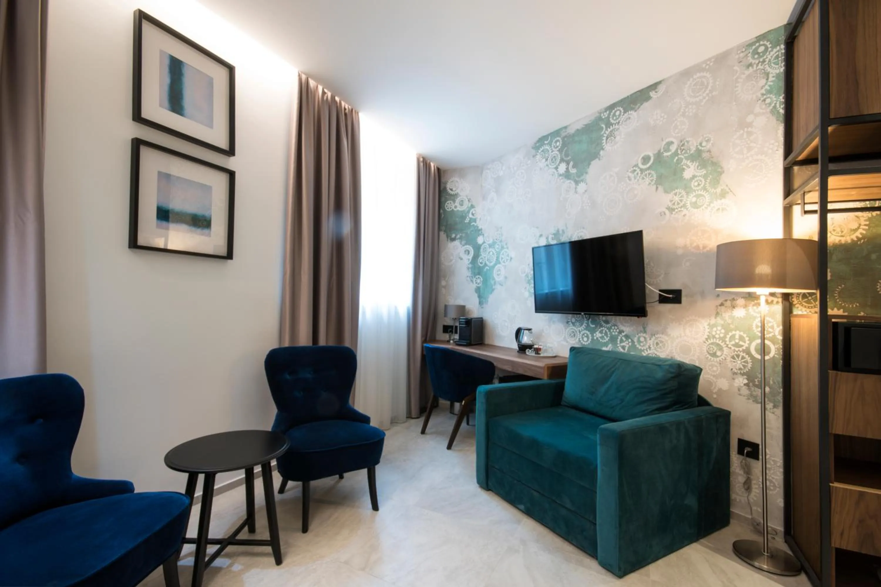 Seating area in The Location Hotel