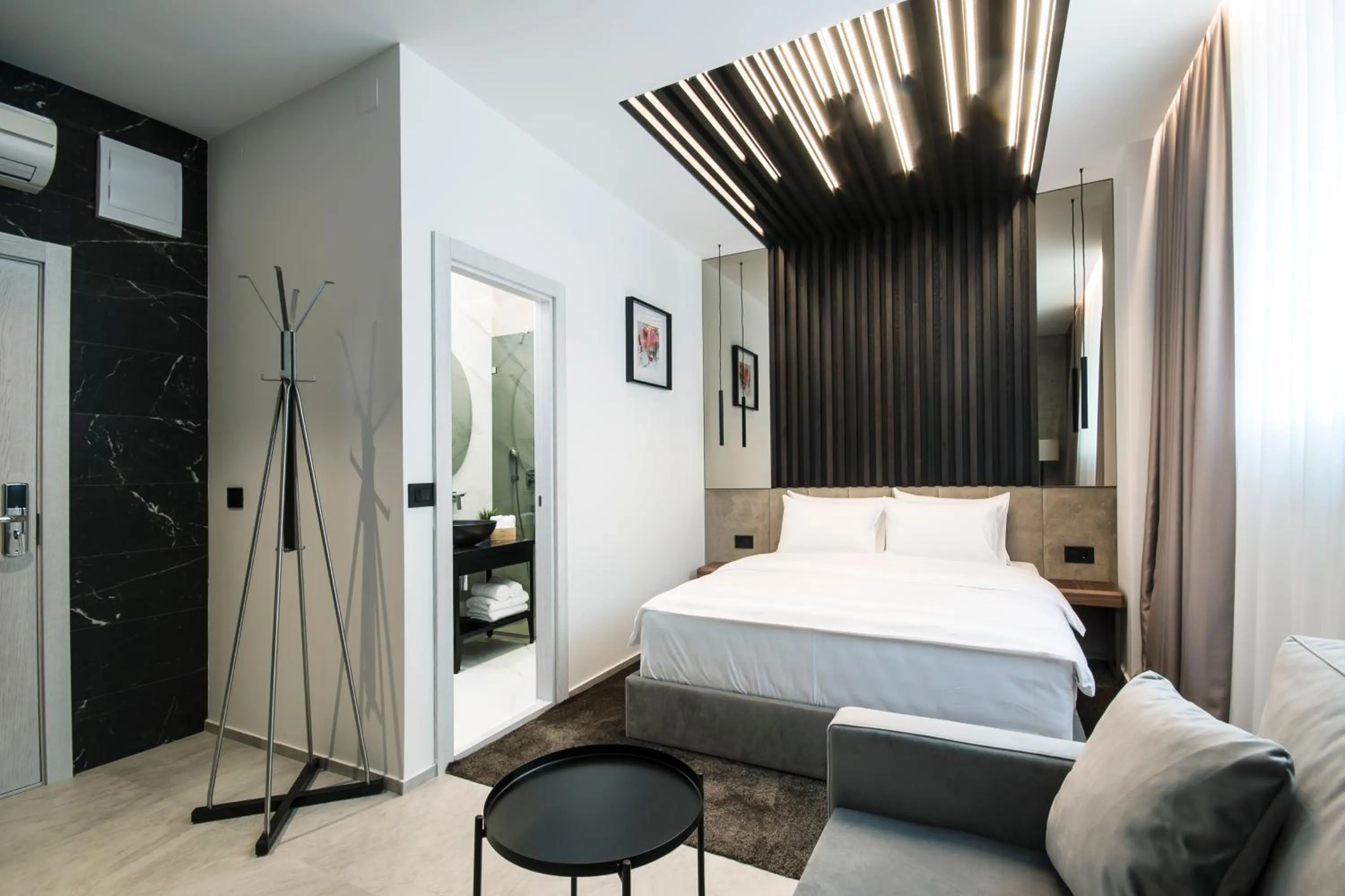 Photo of the whole room, Bed in The Location Hotel