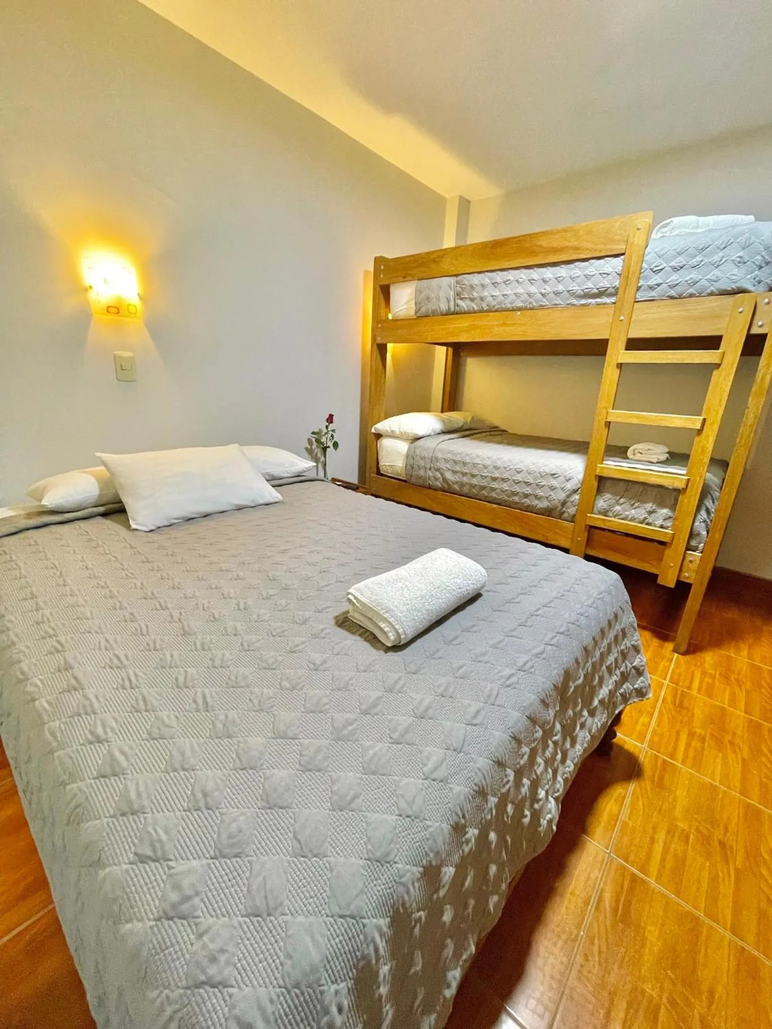 Bed in Jultom Inn Hotel & Suites