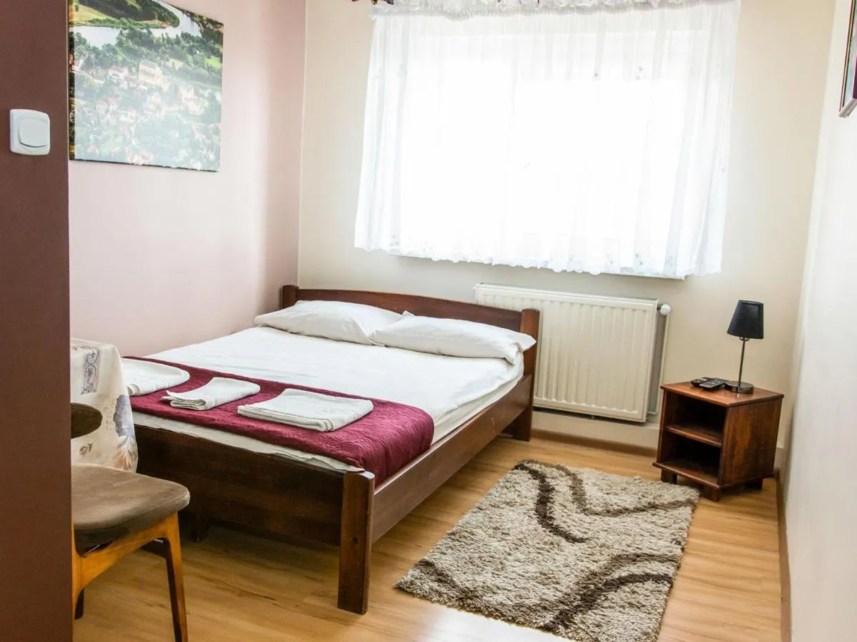 Bed in Zamkowa Noclegi Restauracja