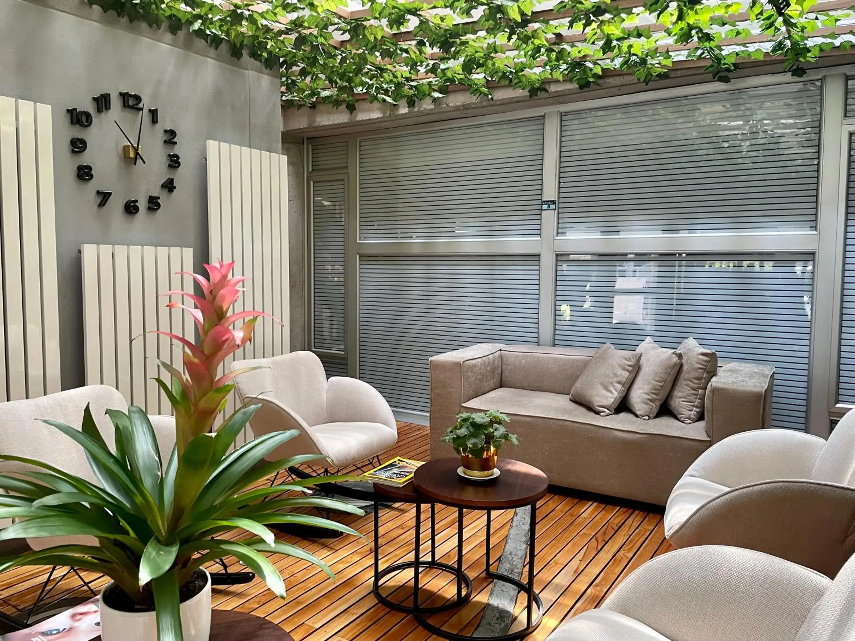 Living room in Hotel 5 Elementos Corferias by HBP Living room in Hotel 5 Elementos Corferias by HBP