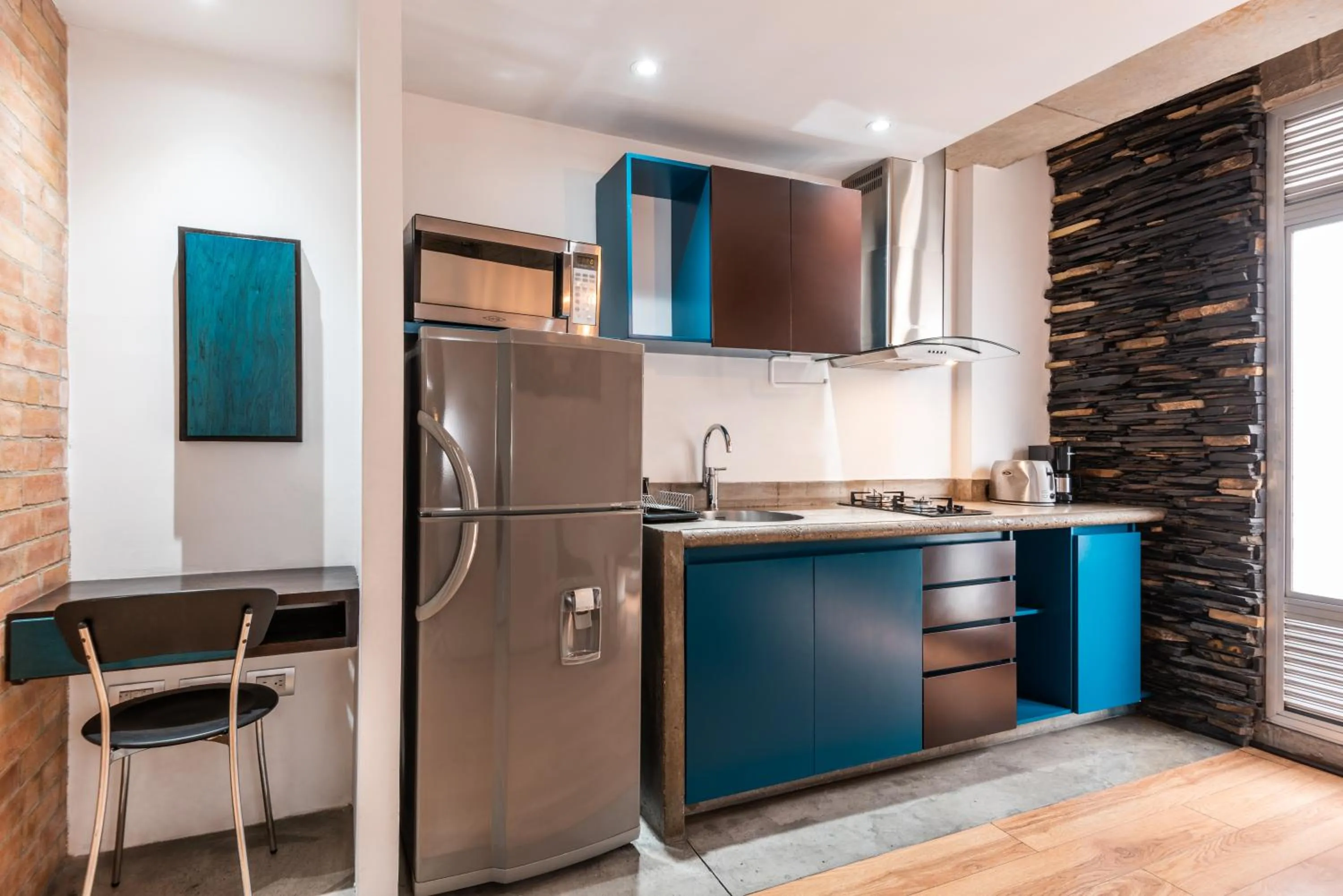 Kitchen or kitchenette in Hotel 5 Elementos Corferias by HBP