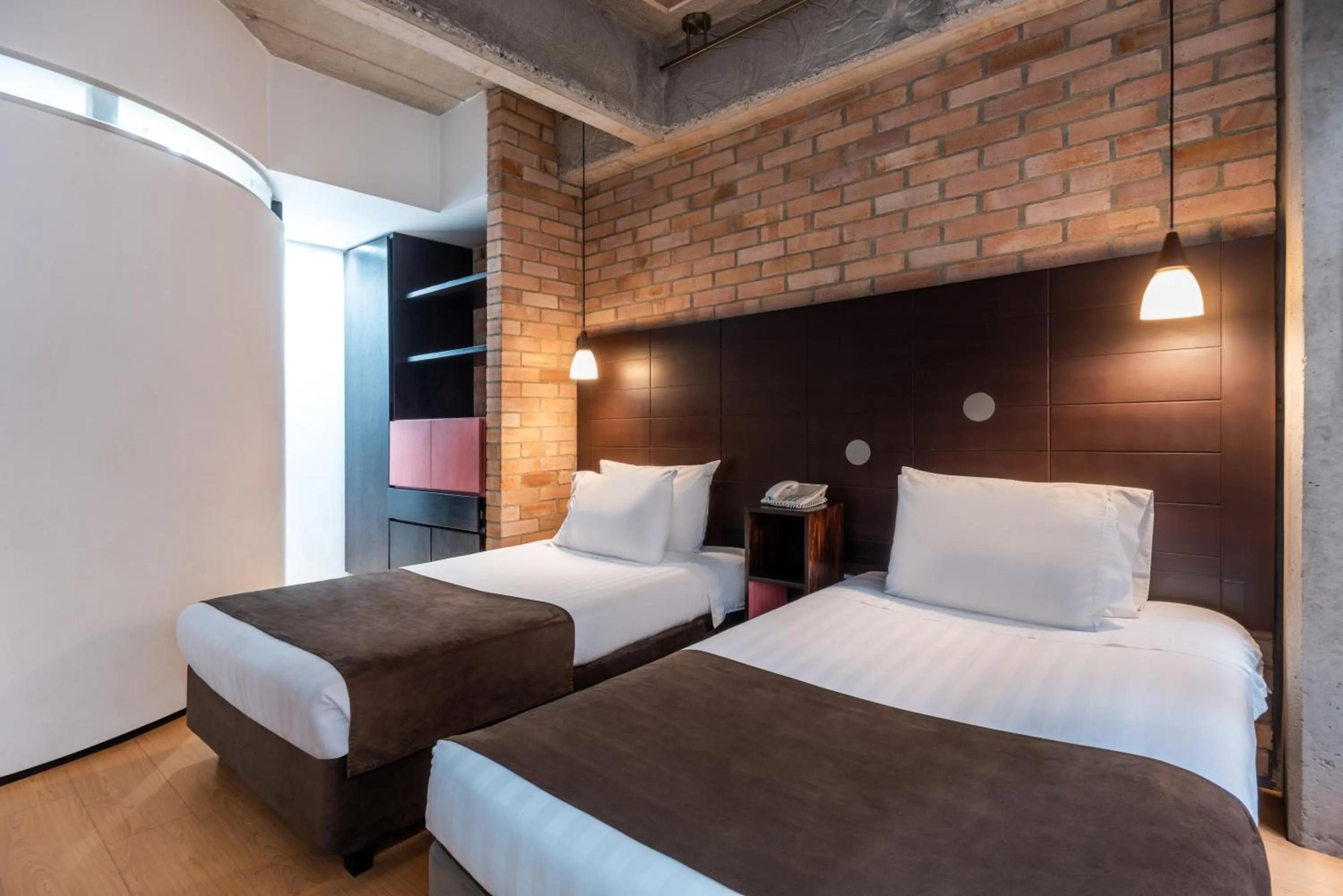 Bed in Hotel 5 Elementos Corferias by HBP