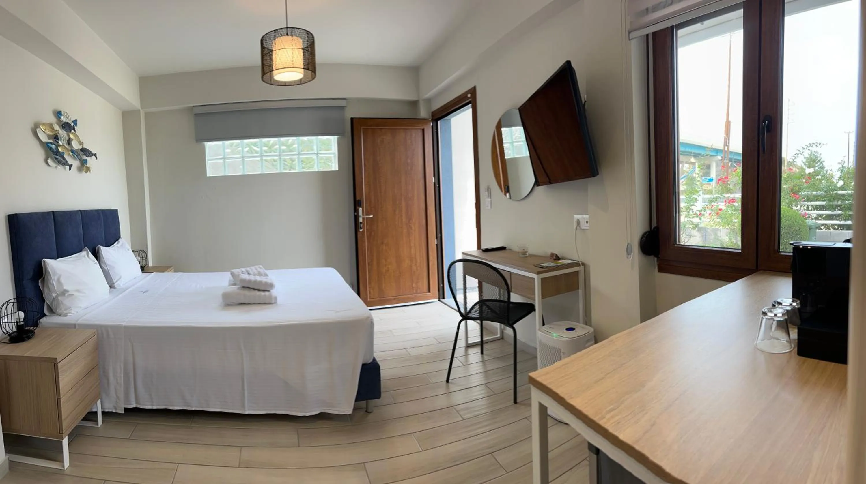 Photo of the whole room in PORTO PORTES suites