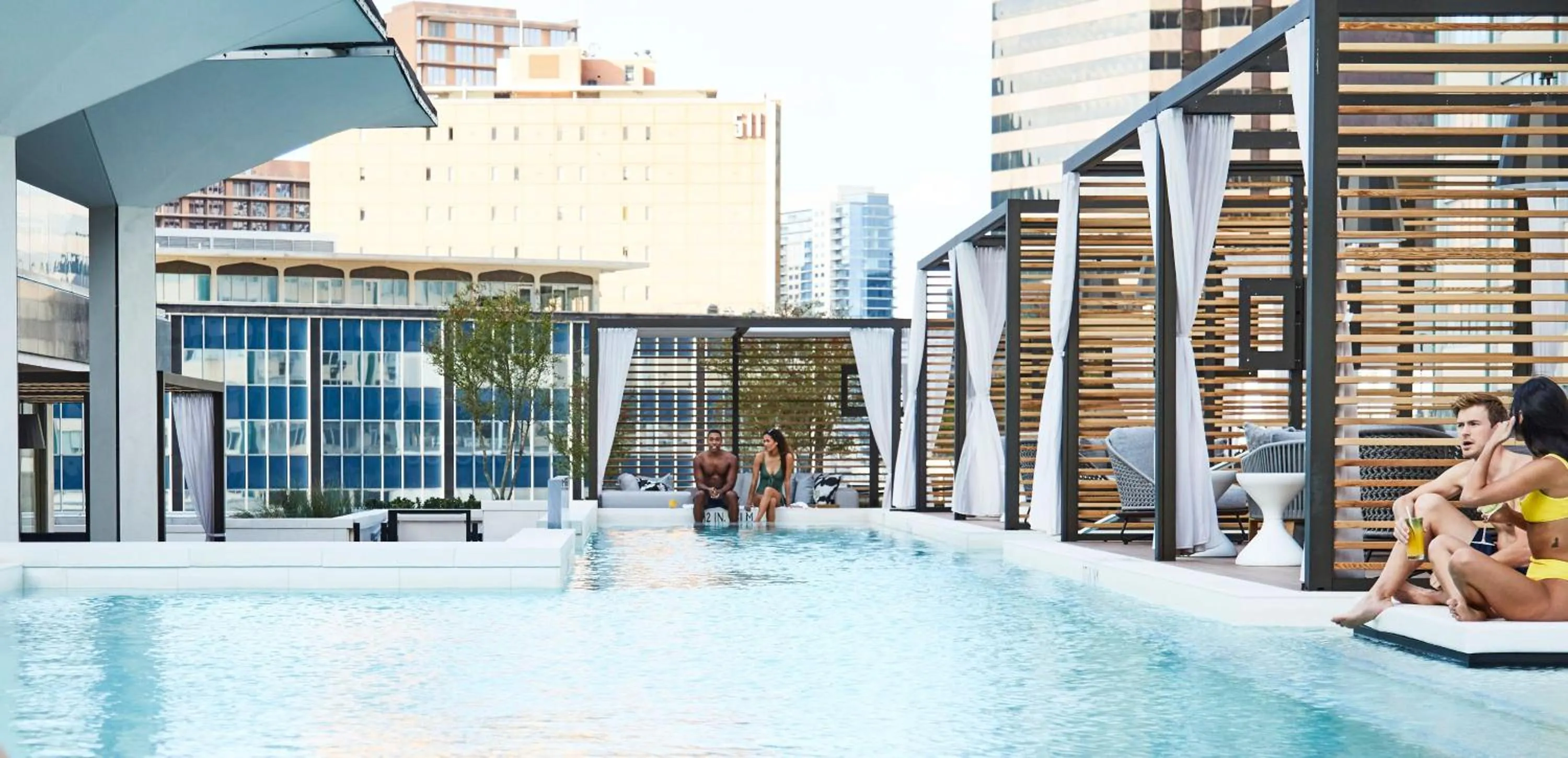 Swimming pool in Thompson Dallas, by Hyatt