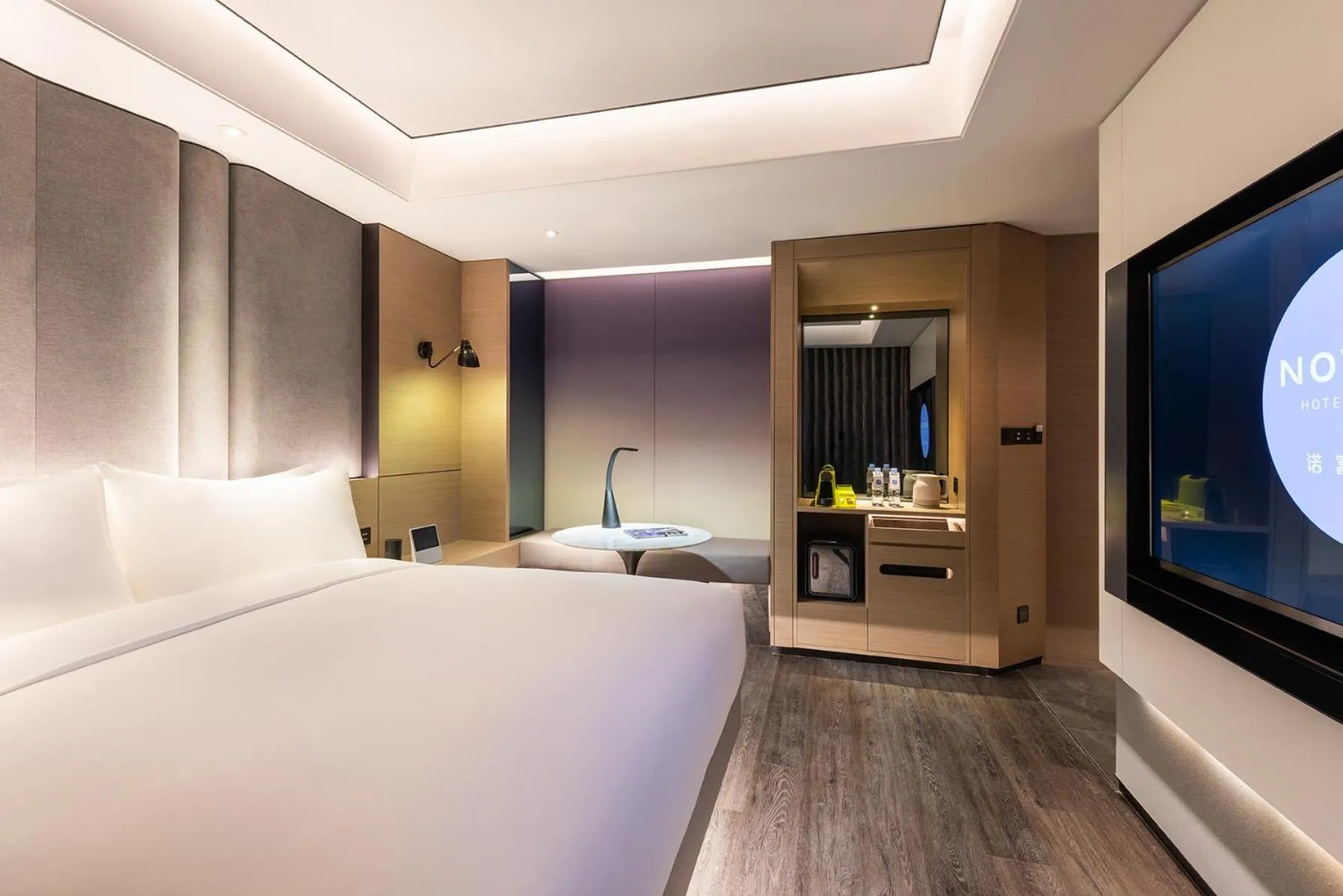 Photo of the whole room, Bed in Novotel Yangzhou City Center