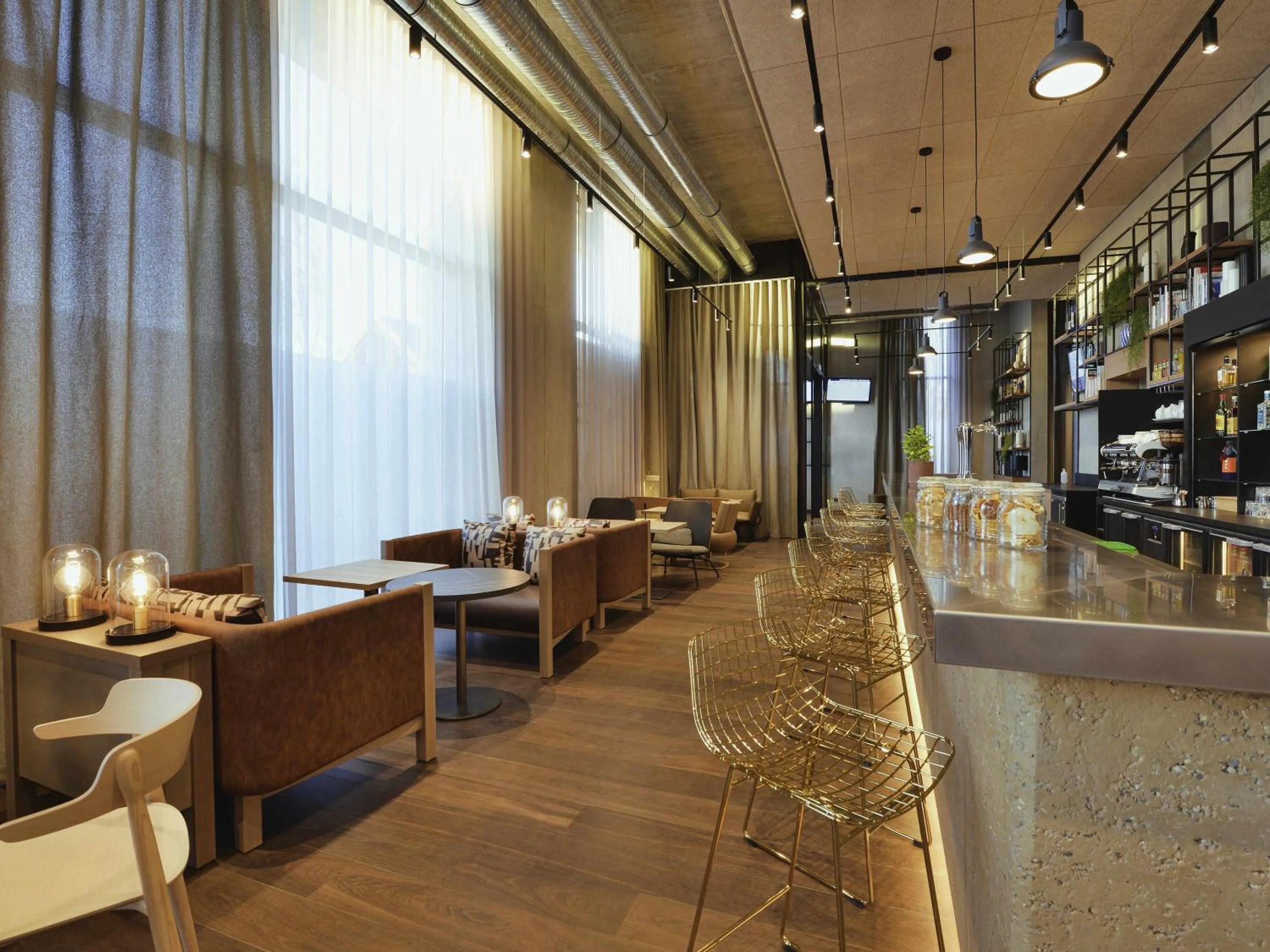 Lounge or bar in Novotel Annemasse Centre - Porte de Genève