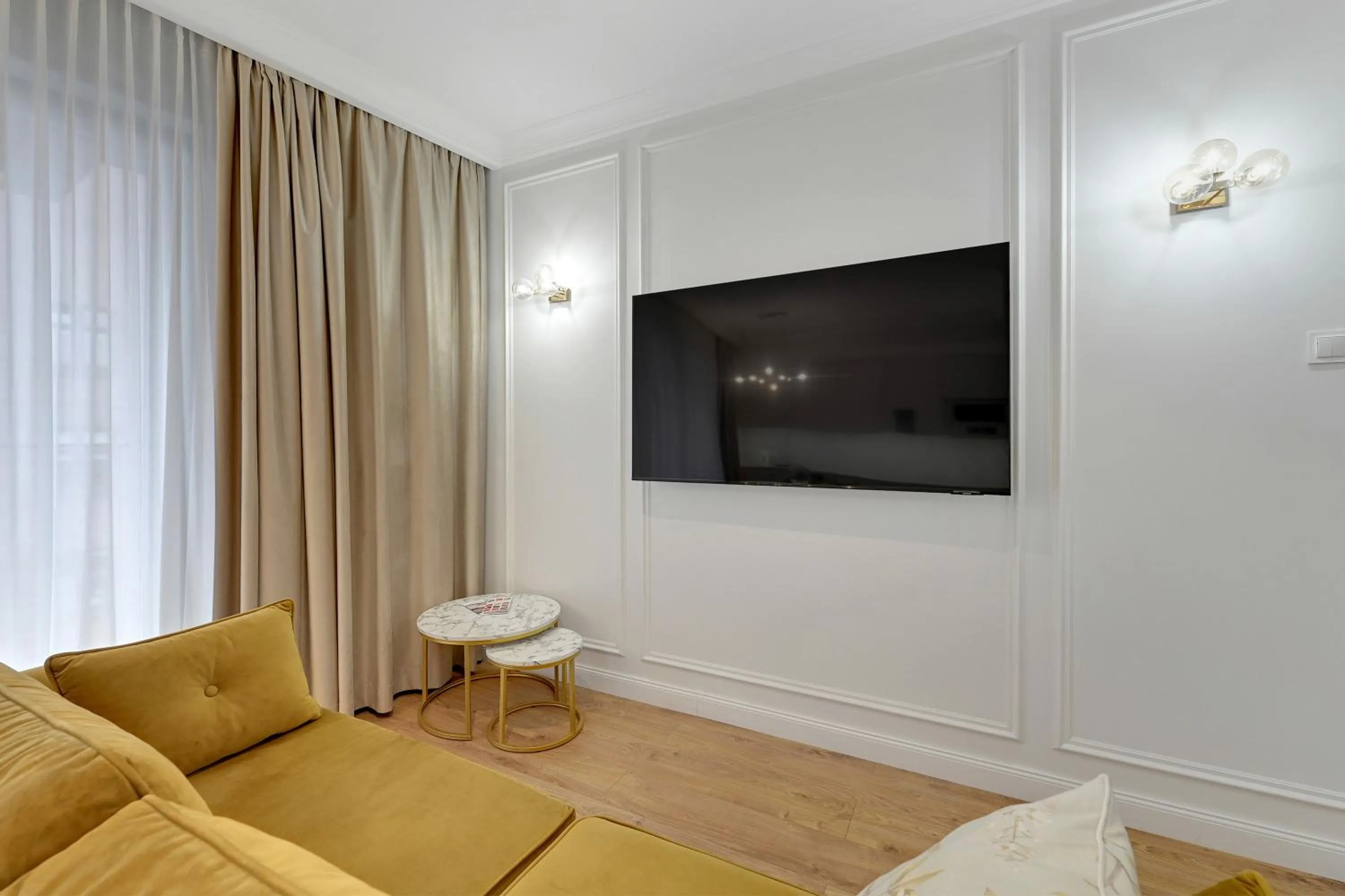 TV and multimedia in GRANO APARTMENTS Gdańsk Residence SPA & Wellness - GRANO APARTMENTS Gdańsk Old Town SPA & Wellness