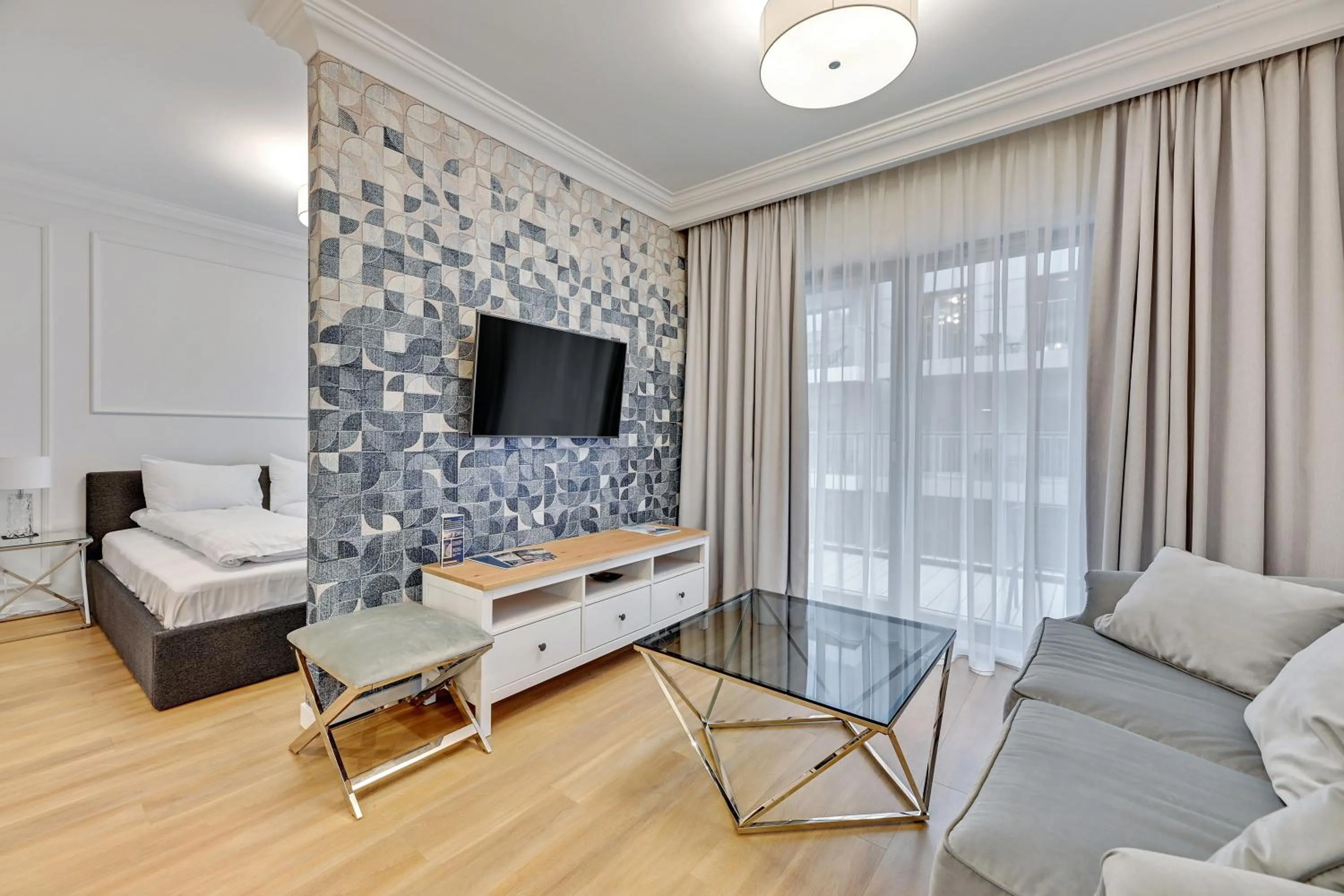 Seating area, Bed in GRANO APARTMENTS Gdańsk Residence SPA & Wellness - GRANO APARTMENTS Gdańsk Old Town SPA & Wellness