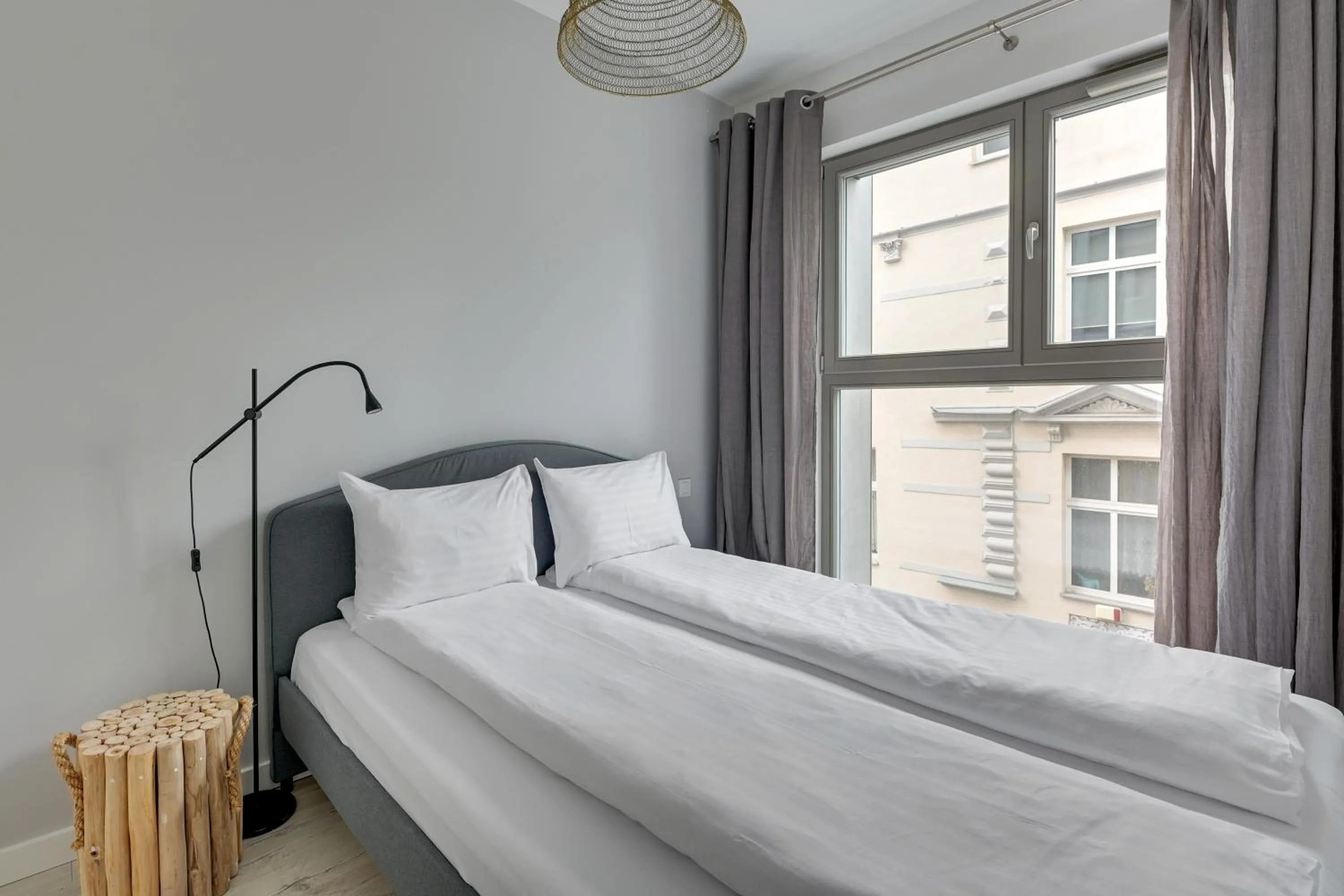 Bed in GRANO APARTMENTS Gdańsk Residence SPA & Wellness - GRANO APARTMENTS Gdańsk Old Town SPA & Wellness