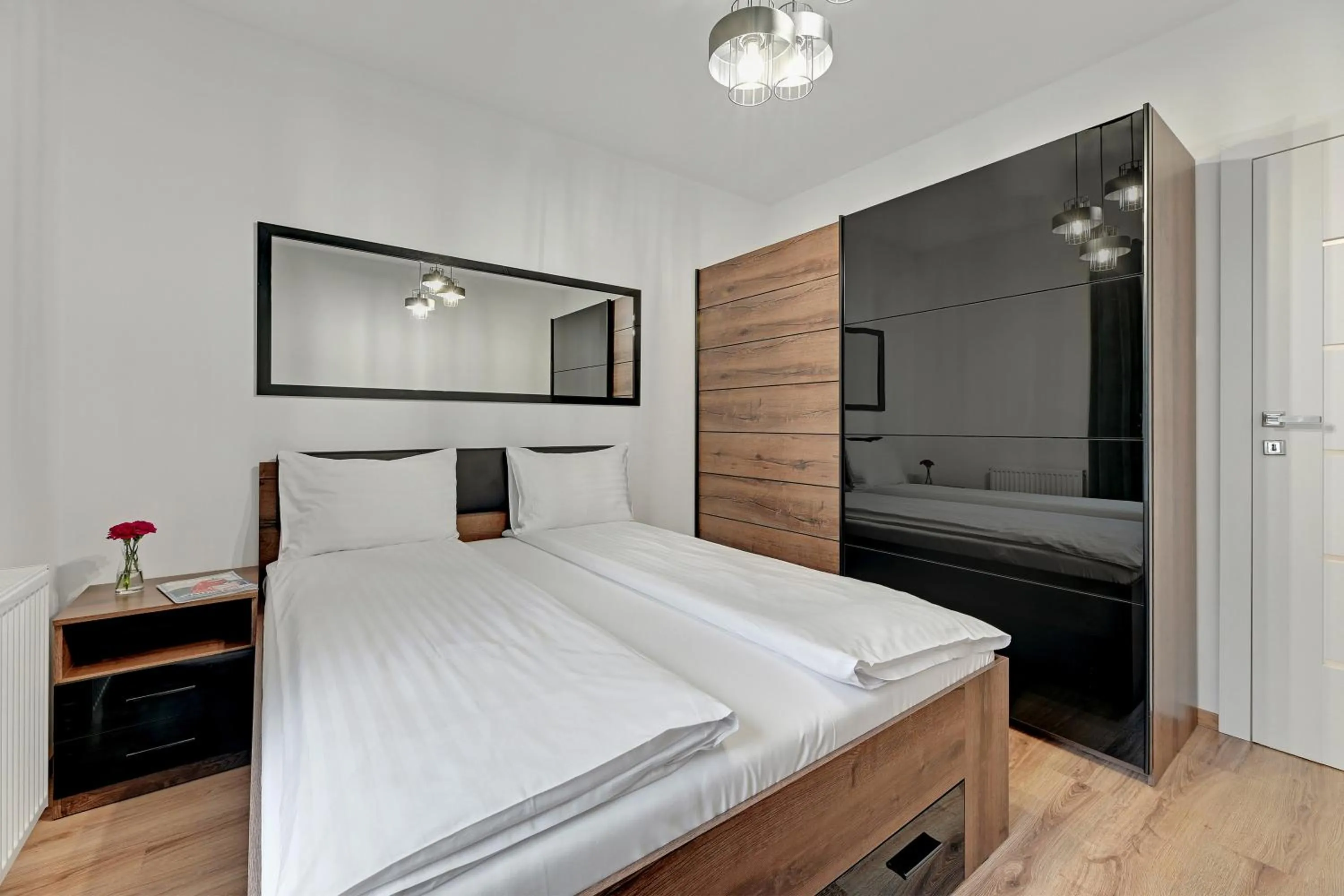 Bed in GRANO APARTMENTS Gdańsk Residence SPA & Wellness - GRANO APARTMENTS Gdańsk Old Town SPA & Wellness