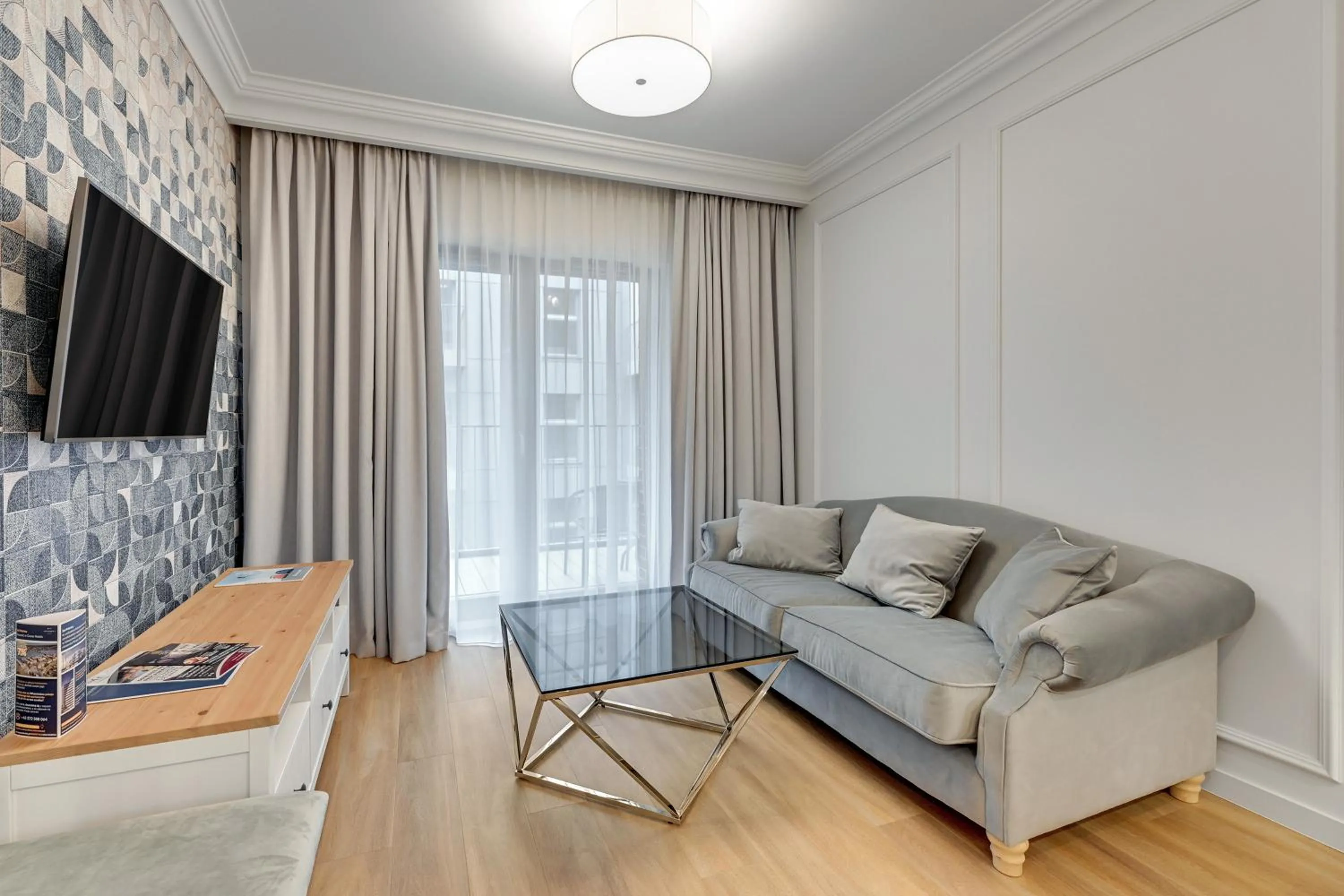 TV and multimedia in GRANO APARTMENTS Gdańsk Residence SPA & Wellness - GRANO APARTMENTS Gdańsk Old Town SPA & Wellness