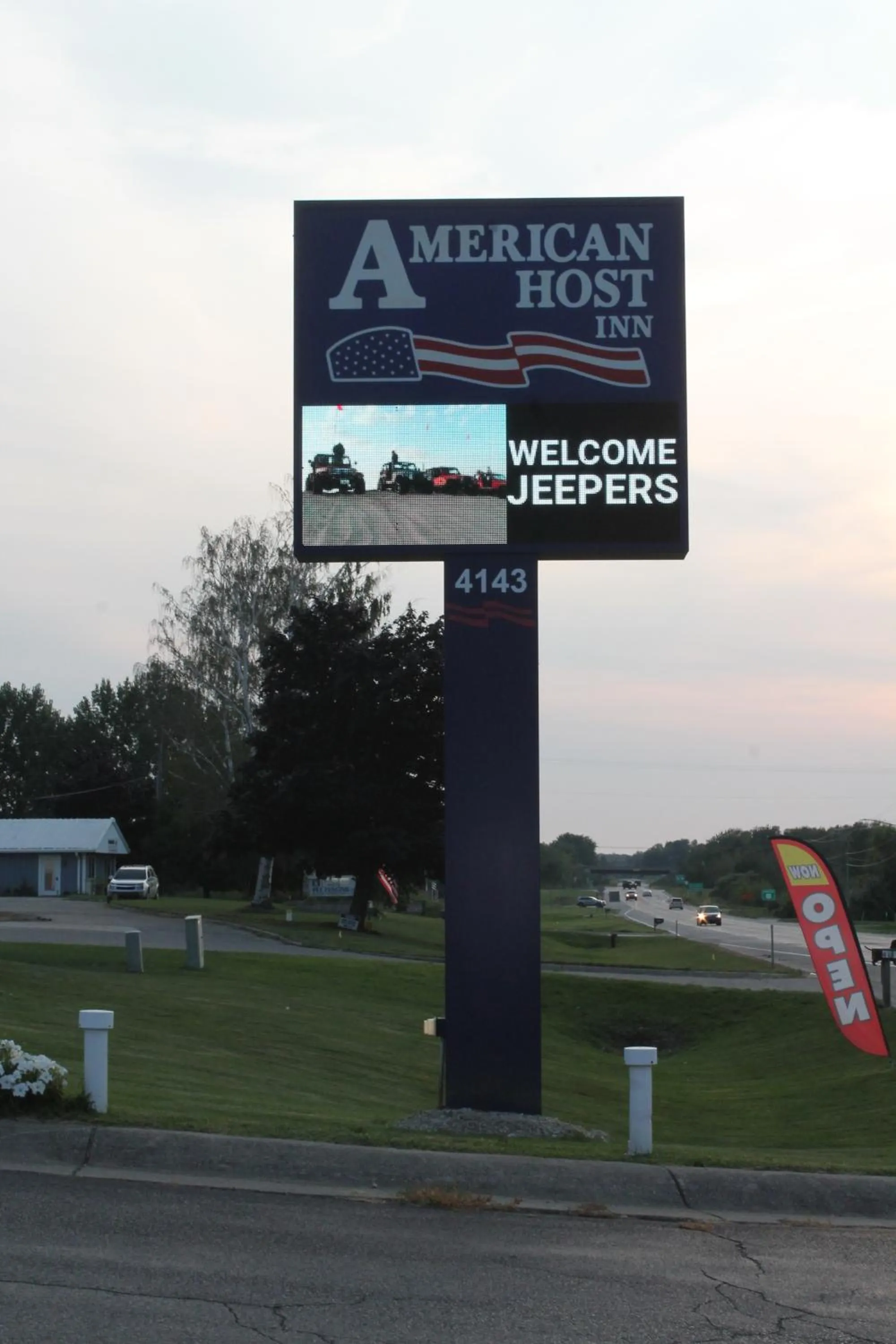 Property logo or sign in American Host Inn