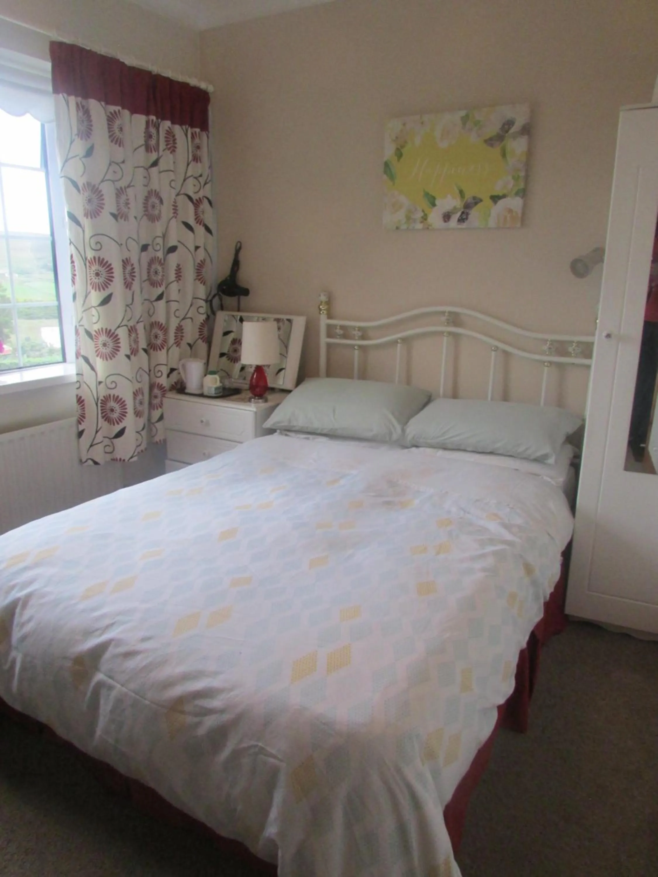 Bed in The Yellow Rose B&B