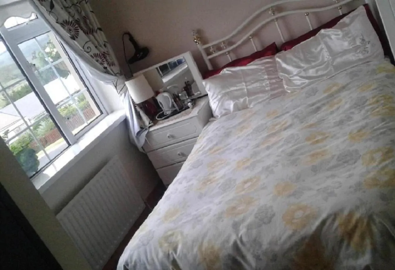 Bed in The Yellow Rose B&B