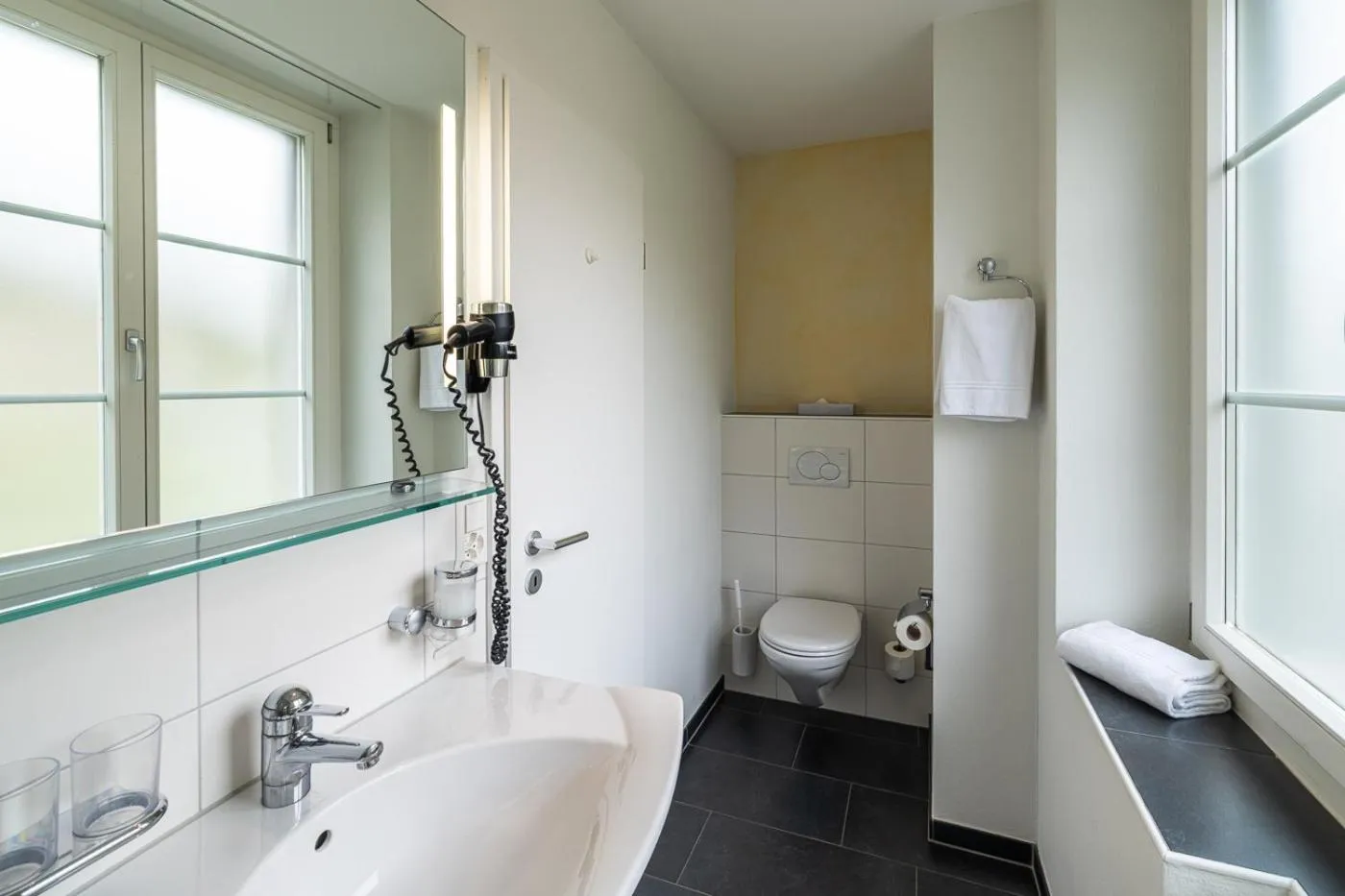 Bathroom in Parkhotel Gunten – Beach & Spa