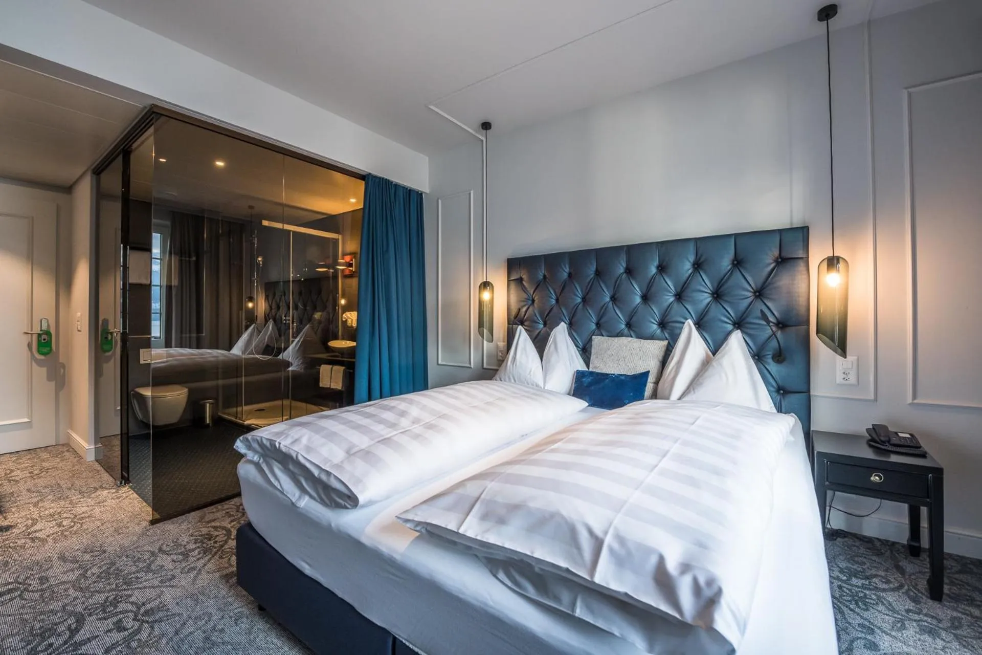Bed in Parkhotel Gunten – Beach & Spa