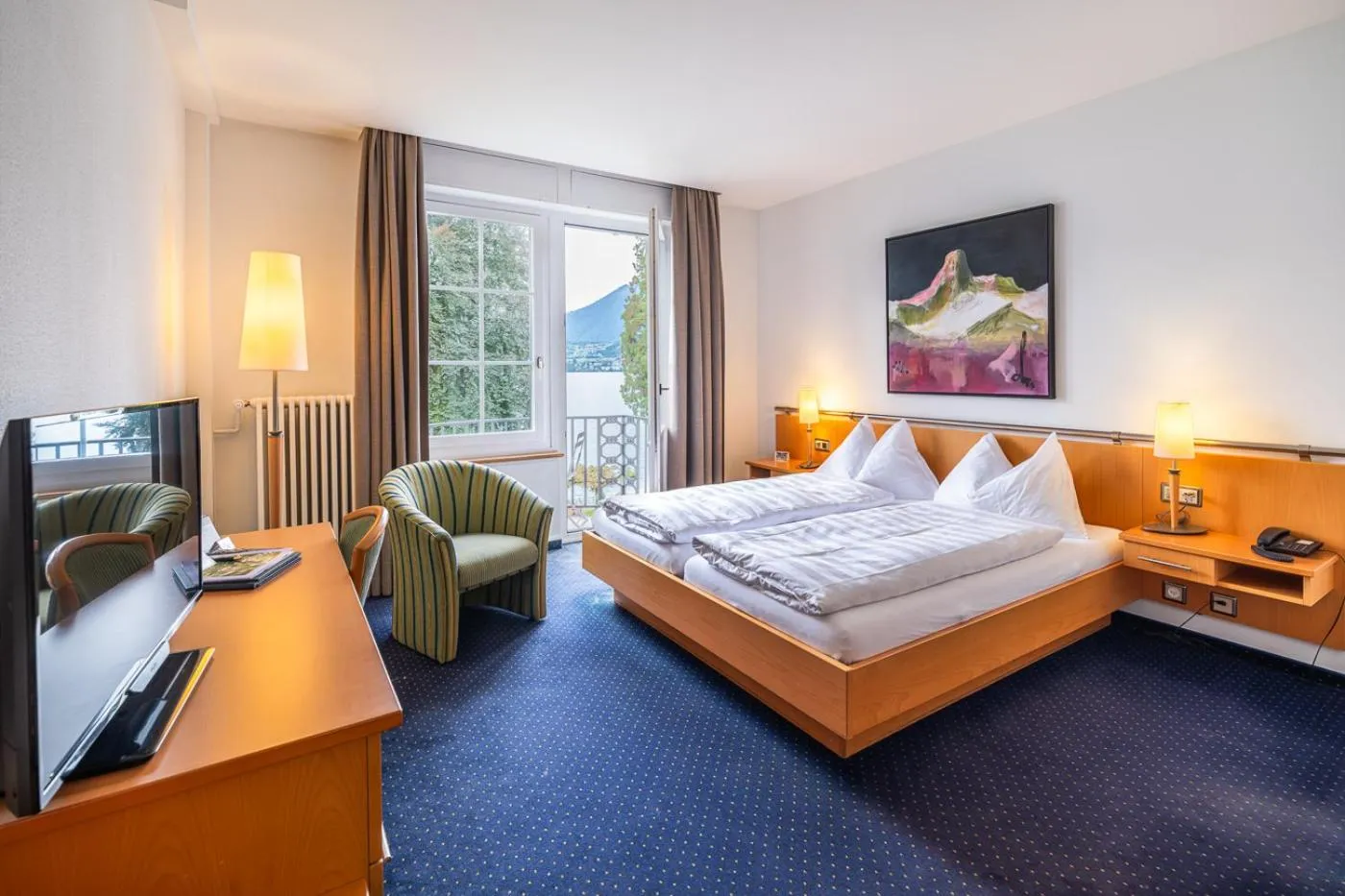 Photo of the whole room, Bed in Parkhotel Gunten – Beach & Spa