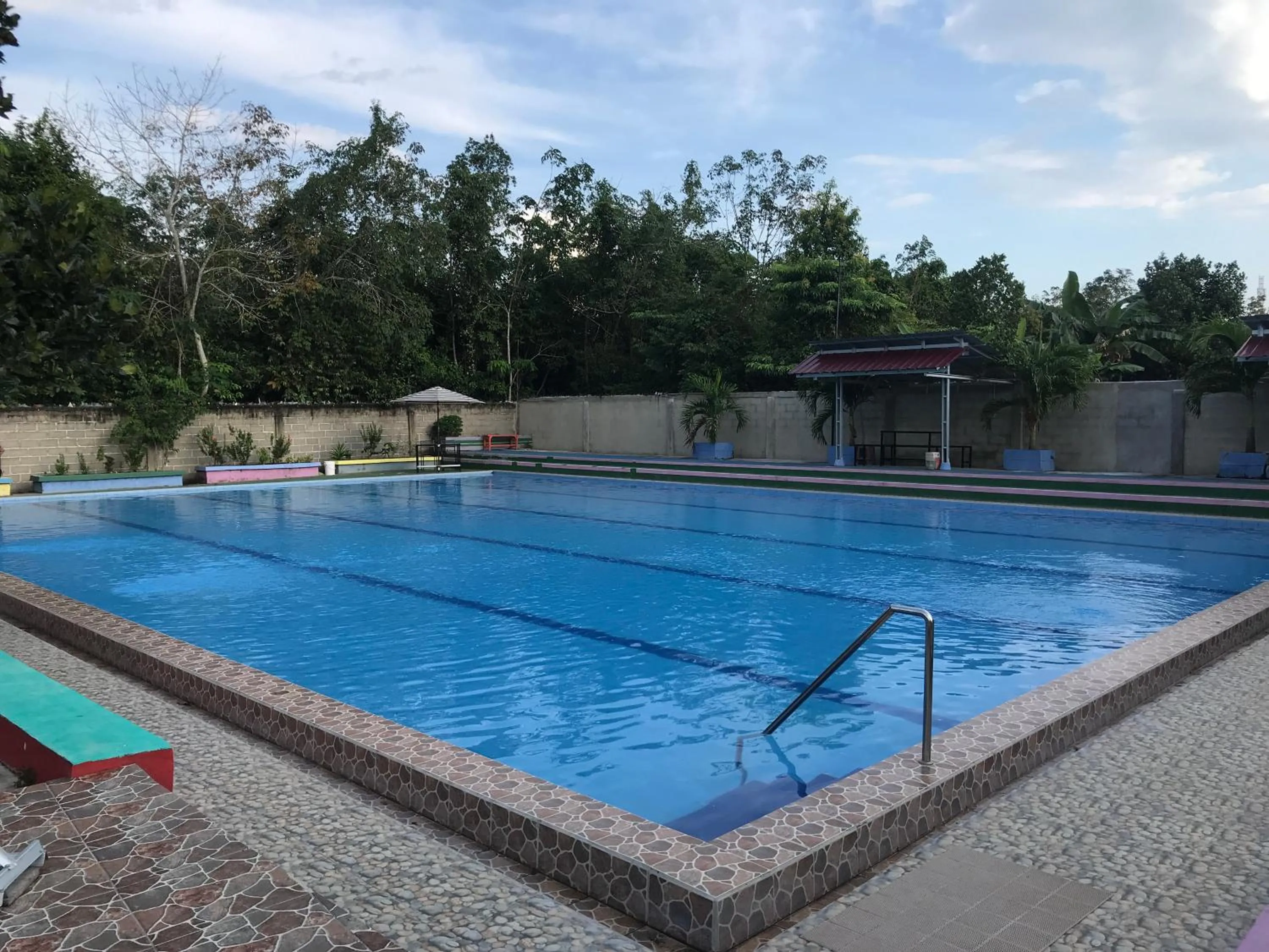 Swimming pool in OYO Life 3874 Rere Residence Syariah