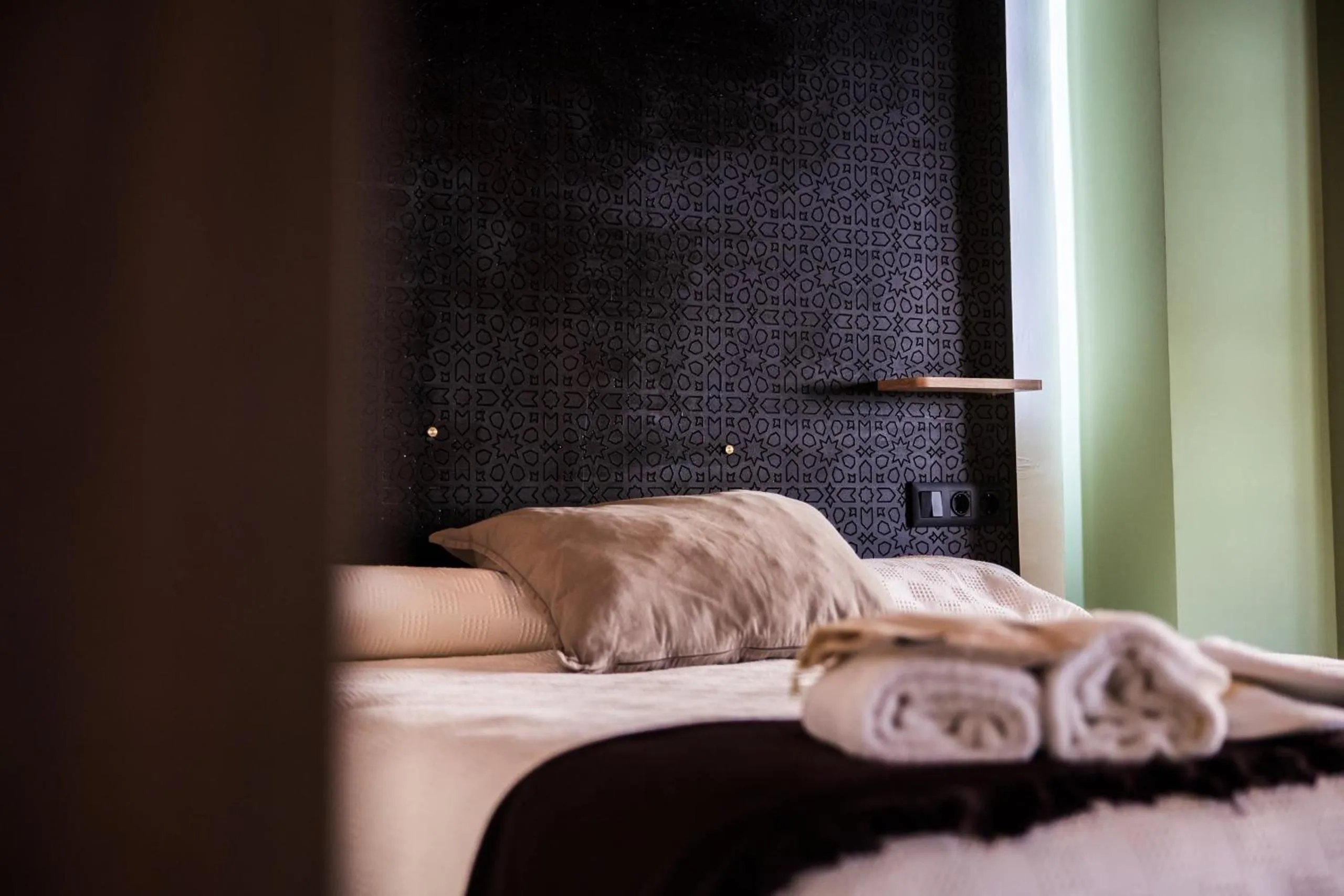 Decorative detail, Bed in Apartamentos Reyes Católicos