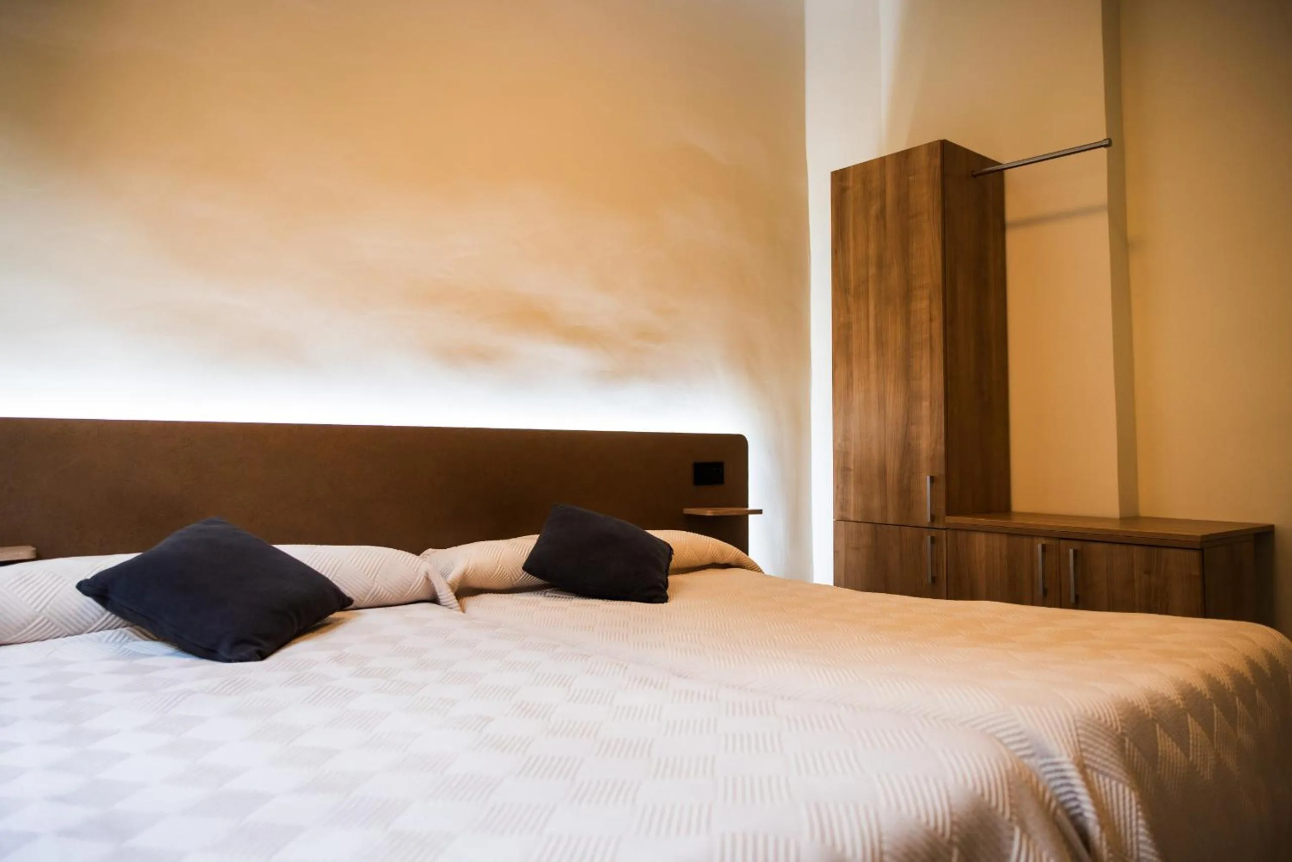 Bed in Apartamentos Reyes Católicos