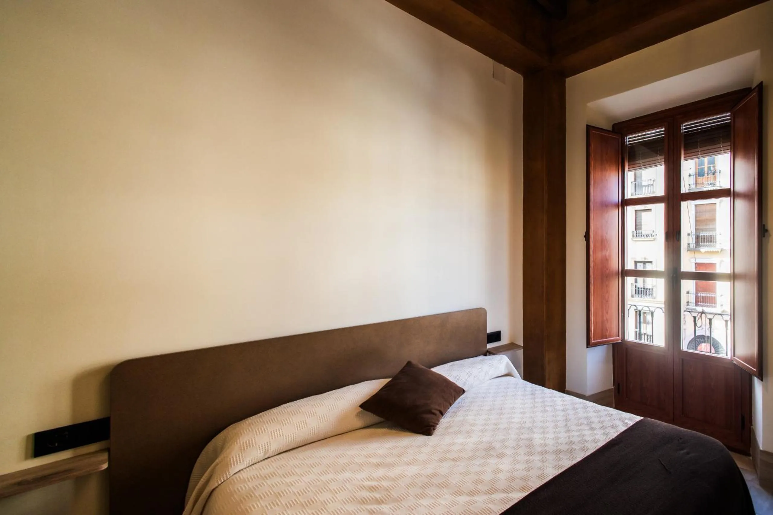 Bed in Apartamentos Reyes Católicos