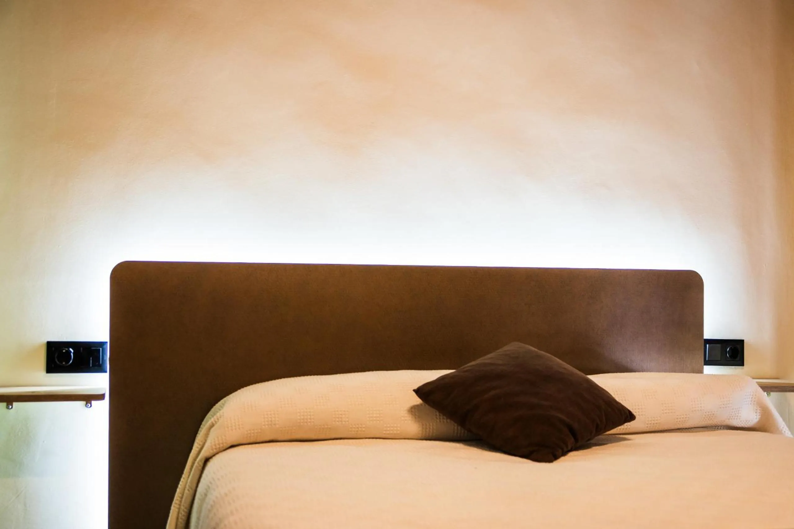 Bed in Apartamentos Reyes Católicos