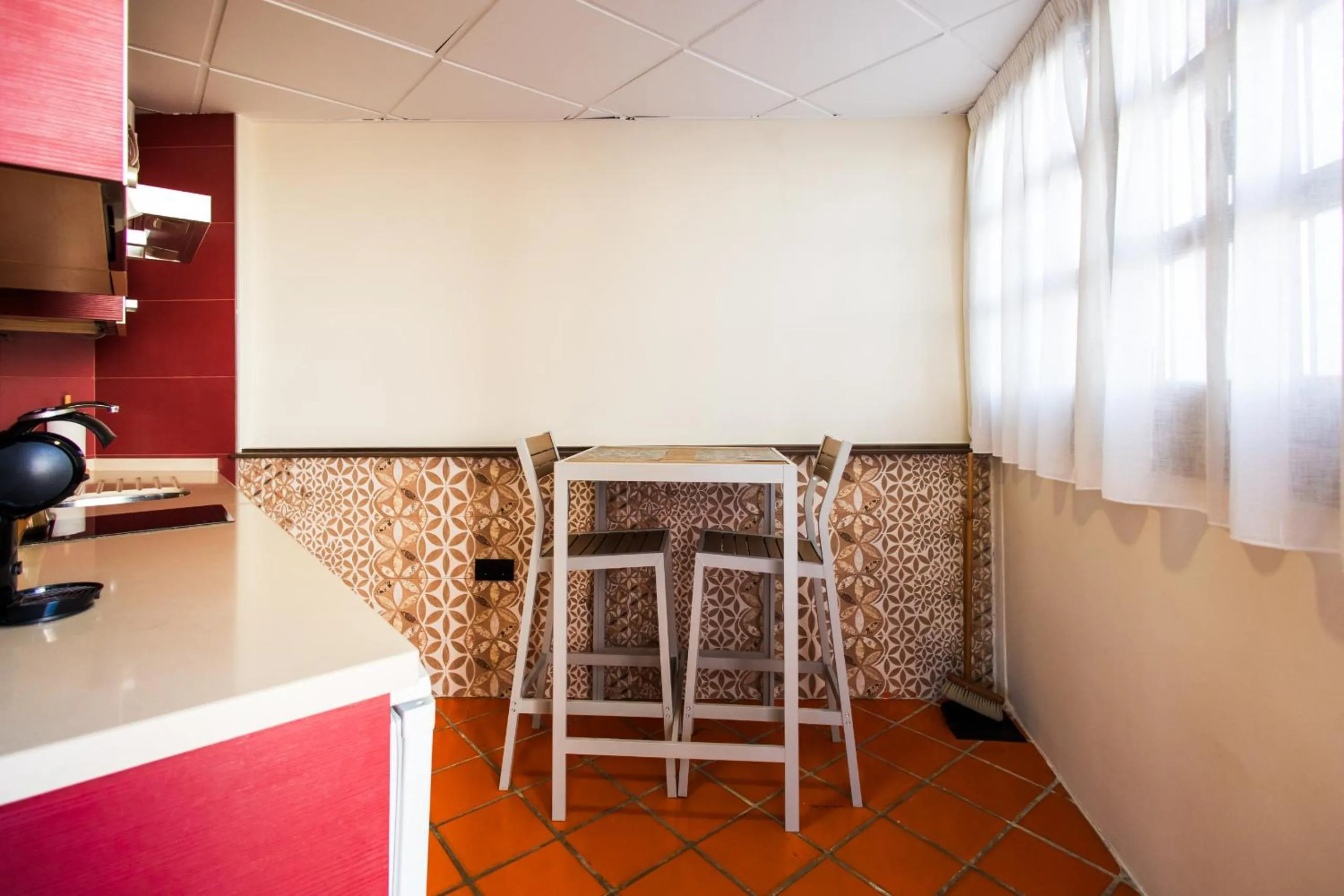 Kitchen or kitchenette in Apartamentos Reyes Católicos