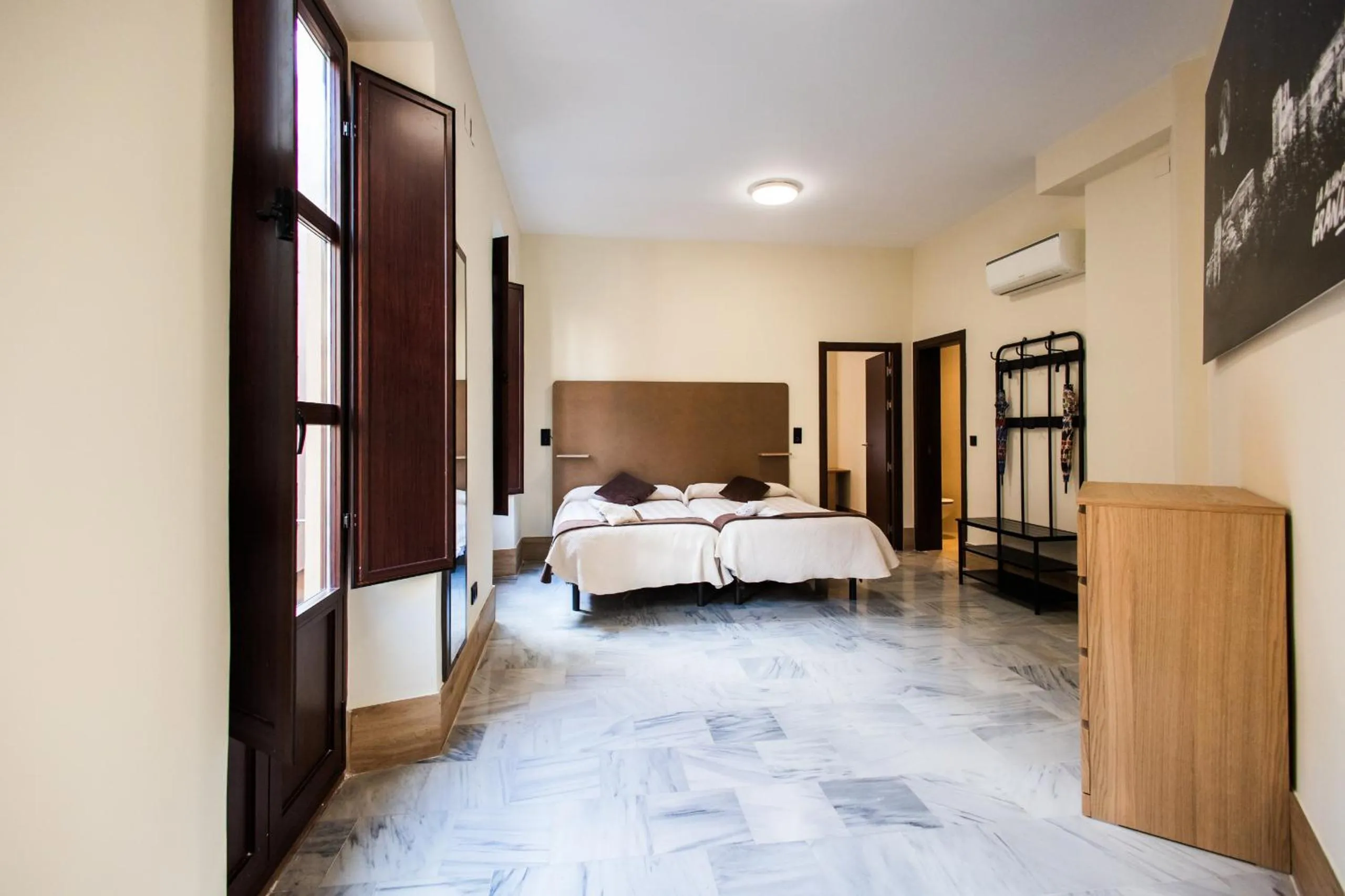 Bed in Apartamentos Reyes Católicos