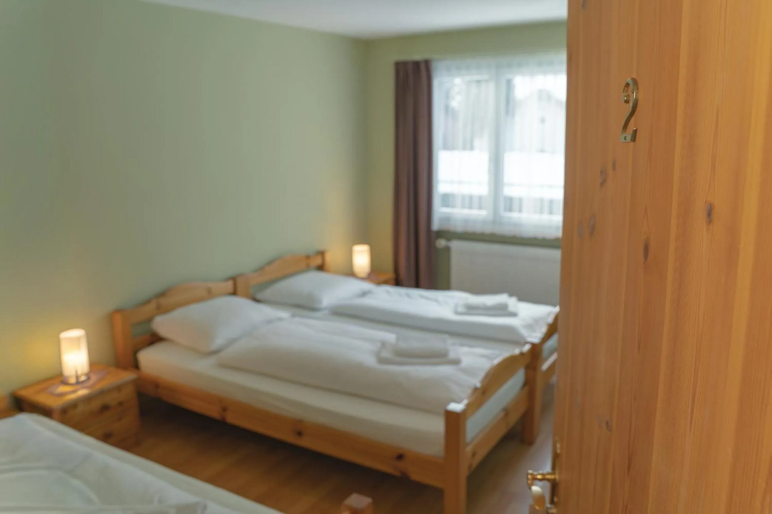 Bed in Hotel Guidon Zimmer