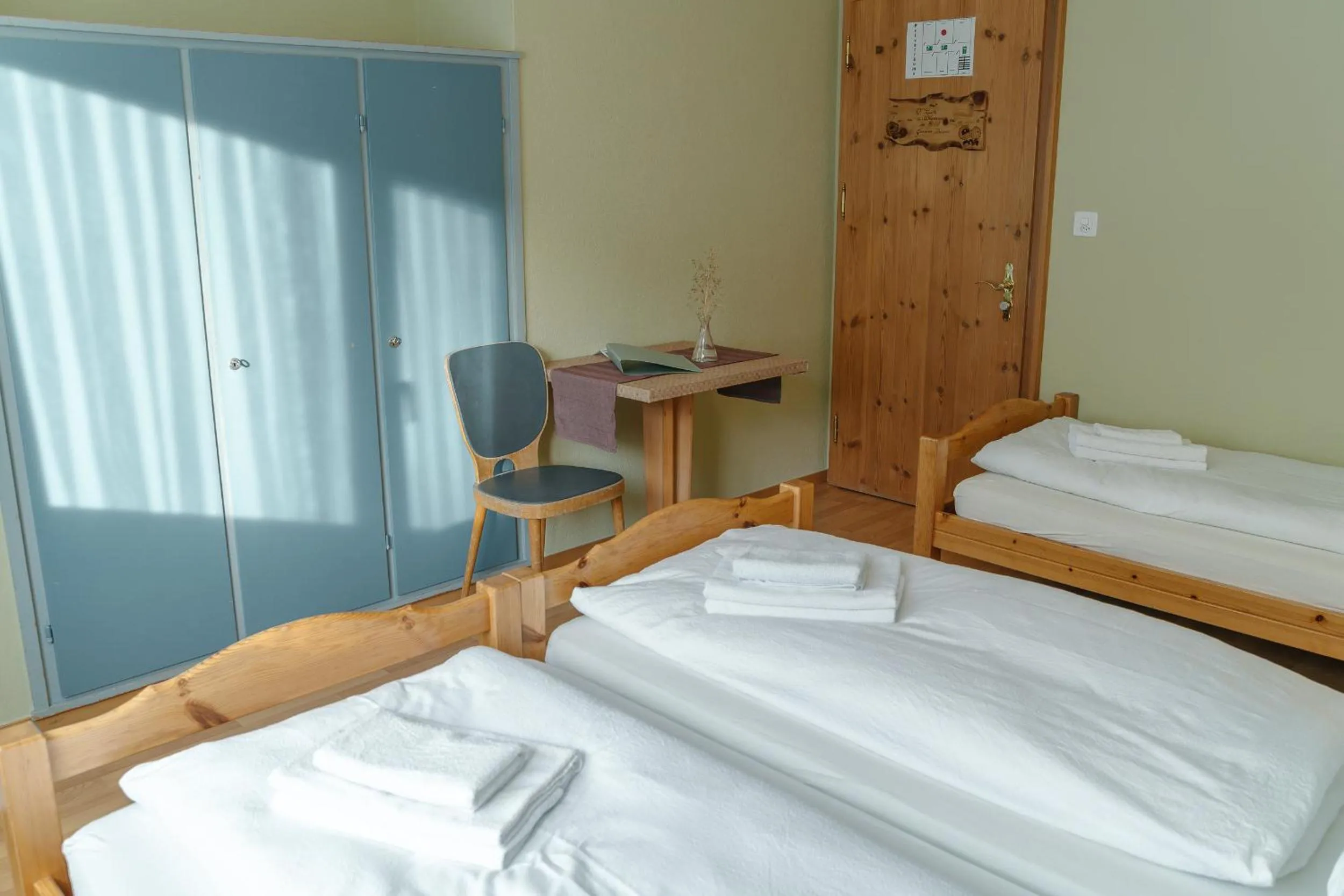 Bed in Hotel Guidon Zimmer