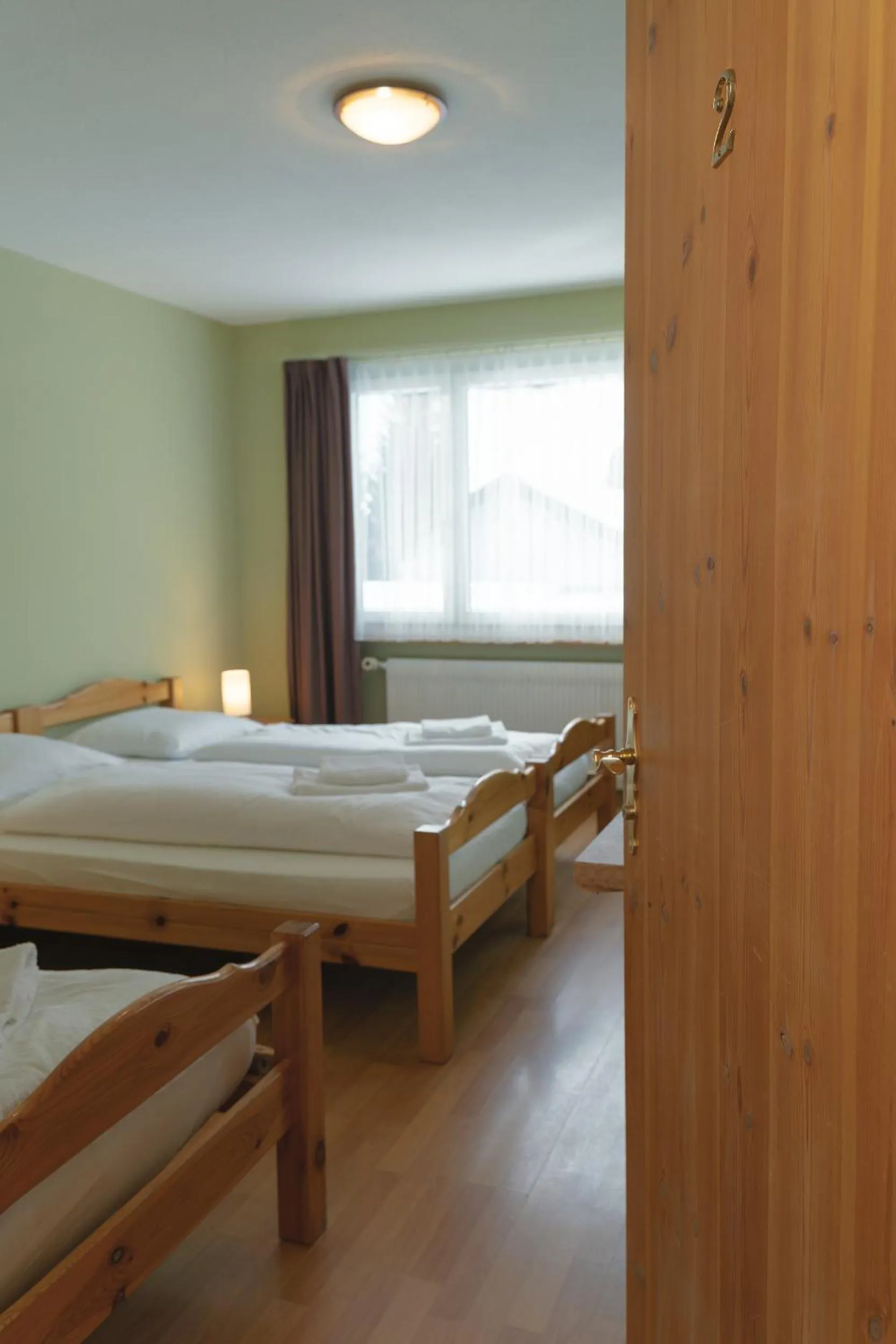 Bed in Hotel Guidon Zimmer