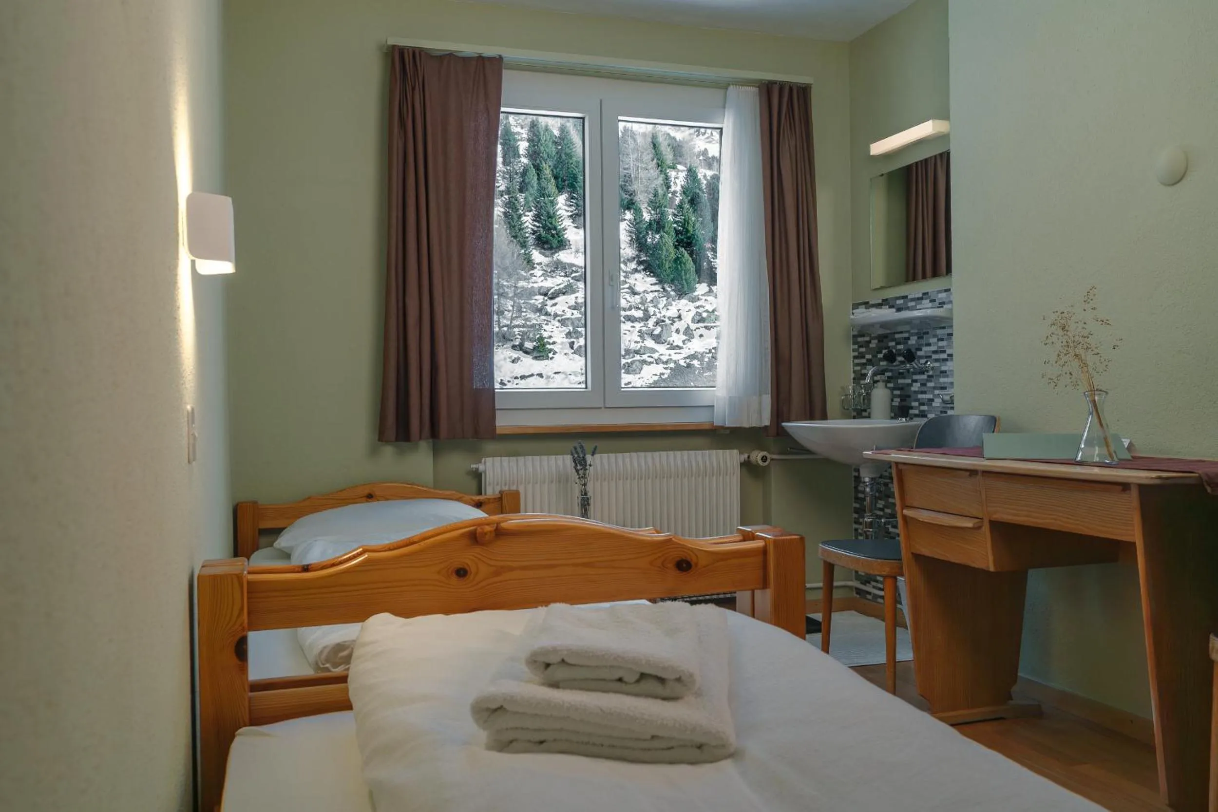 Bed in Hotel Guidon Zimmer