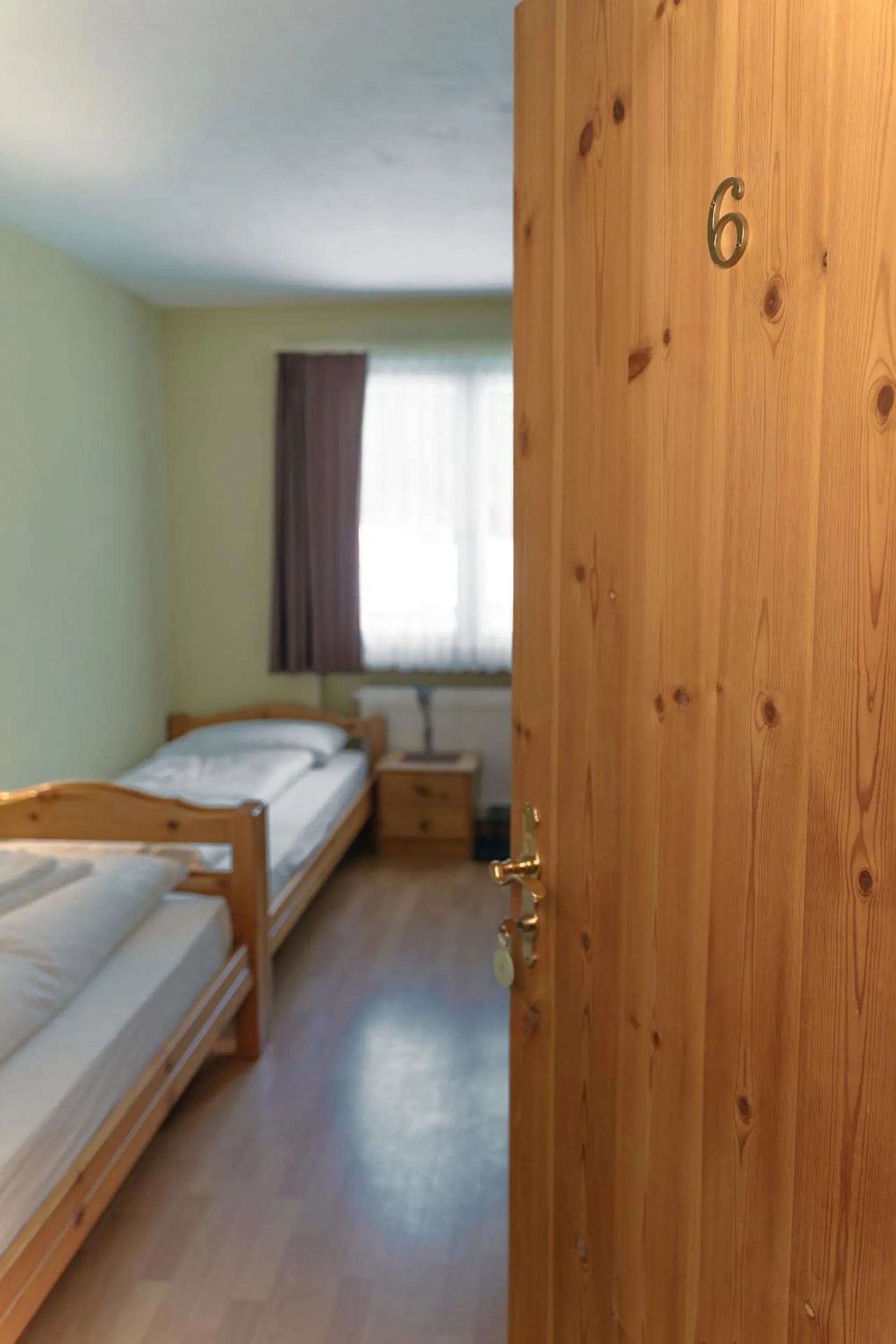 Bed in Hotel Guidon Zimmer