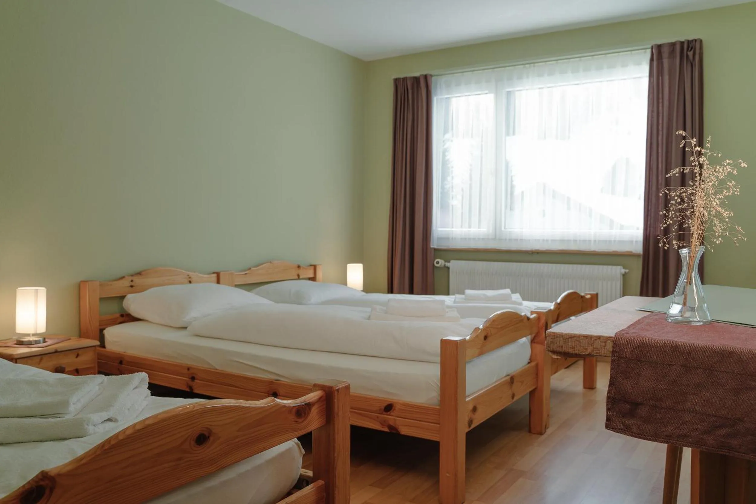 Bed in Hotel Guidon Zimmer