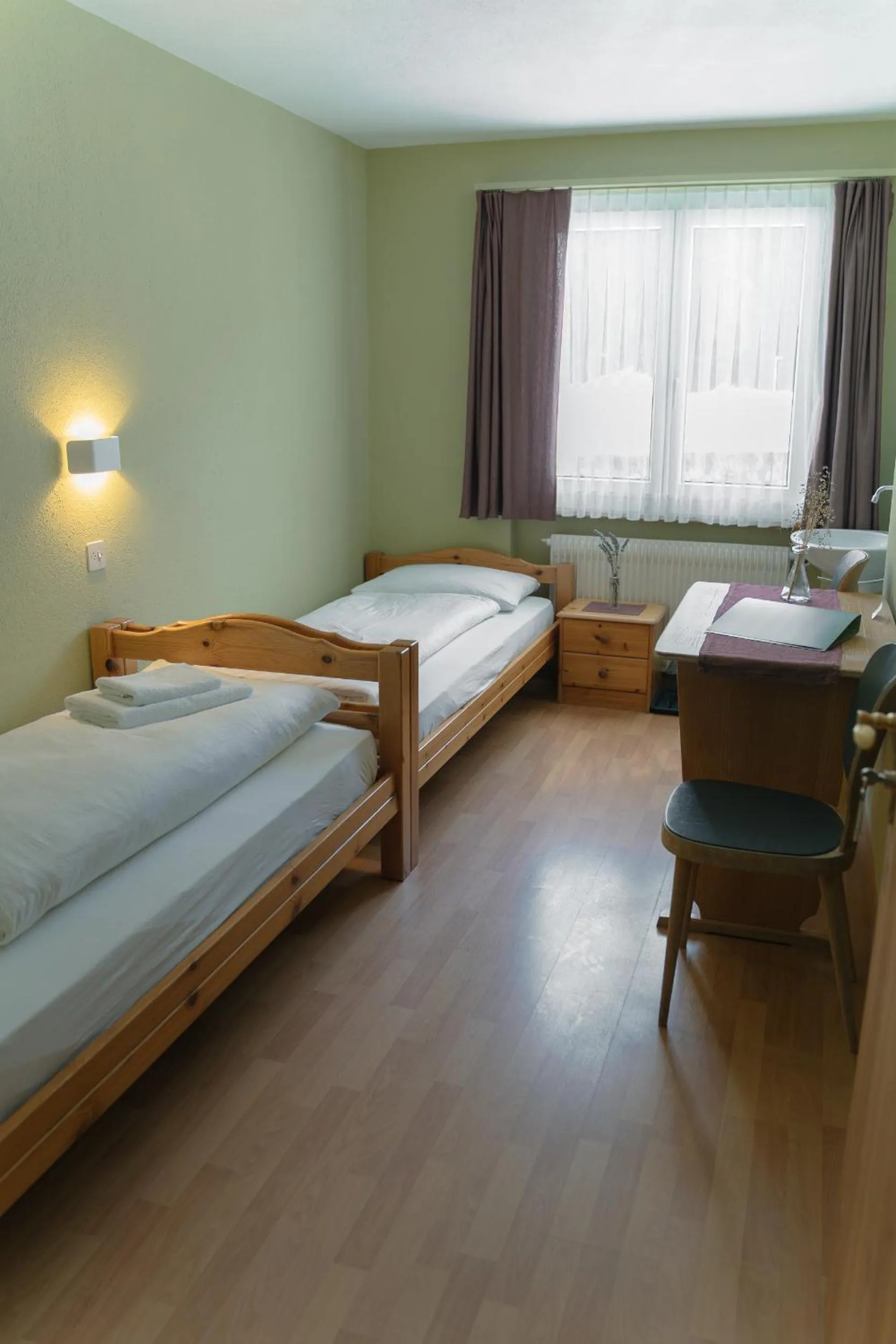 Bed in Hotel Guidon Zimmer