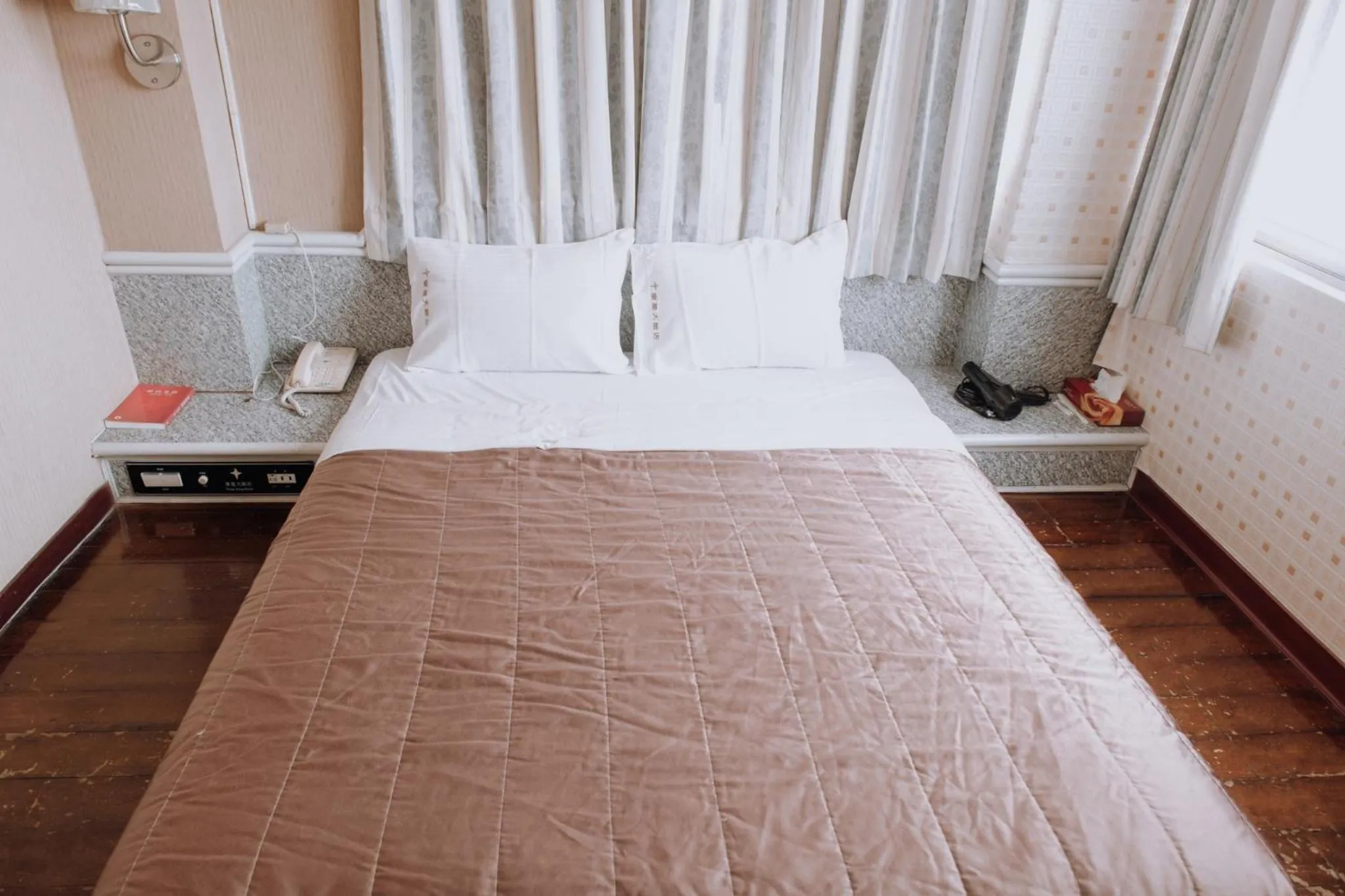 Bed in Tong Hsin Hotel