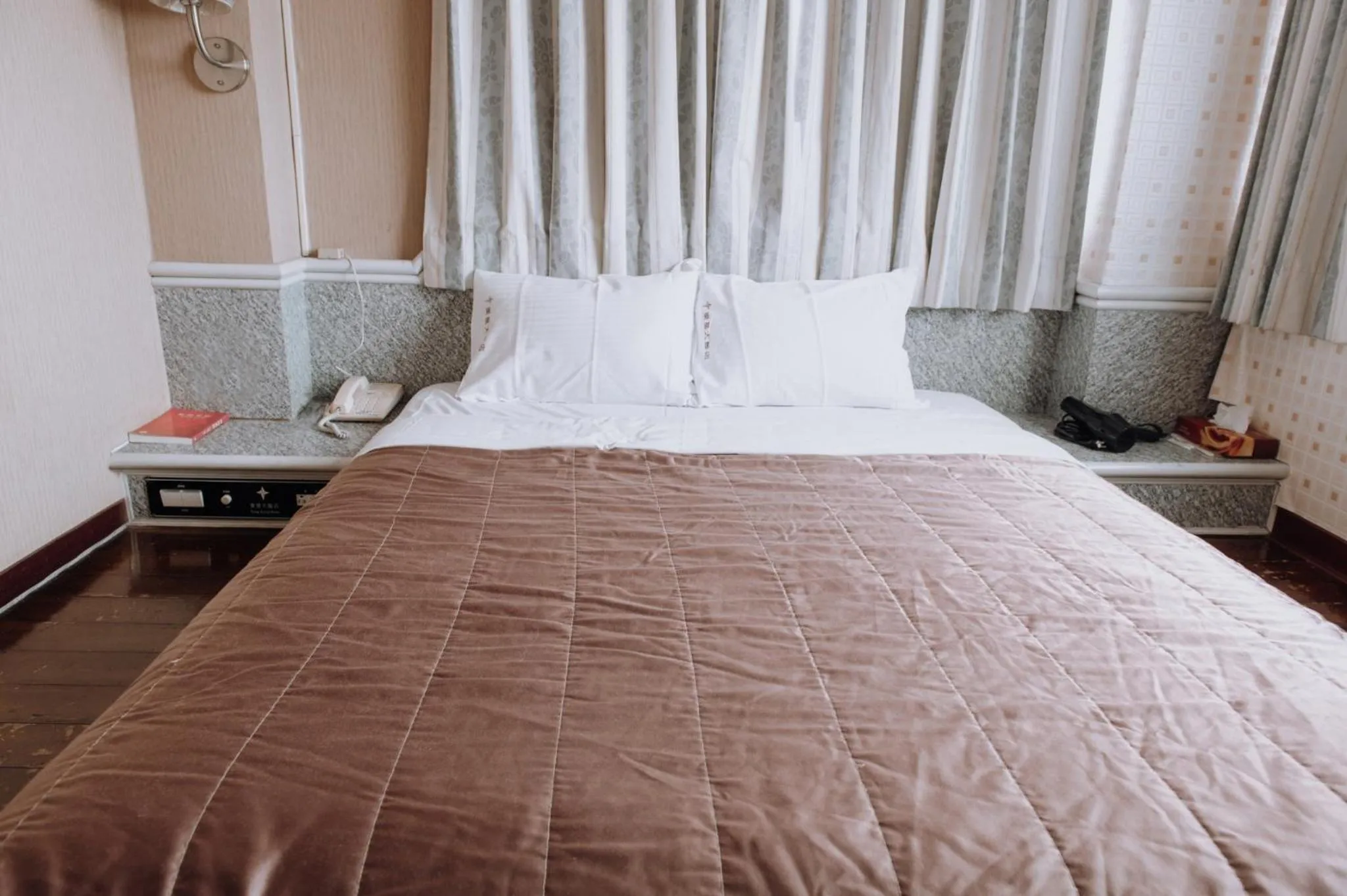 Bed in Tong Hsin Hotel