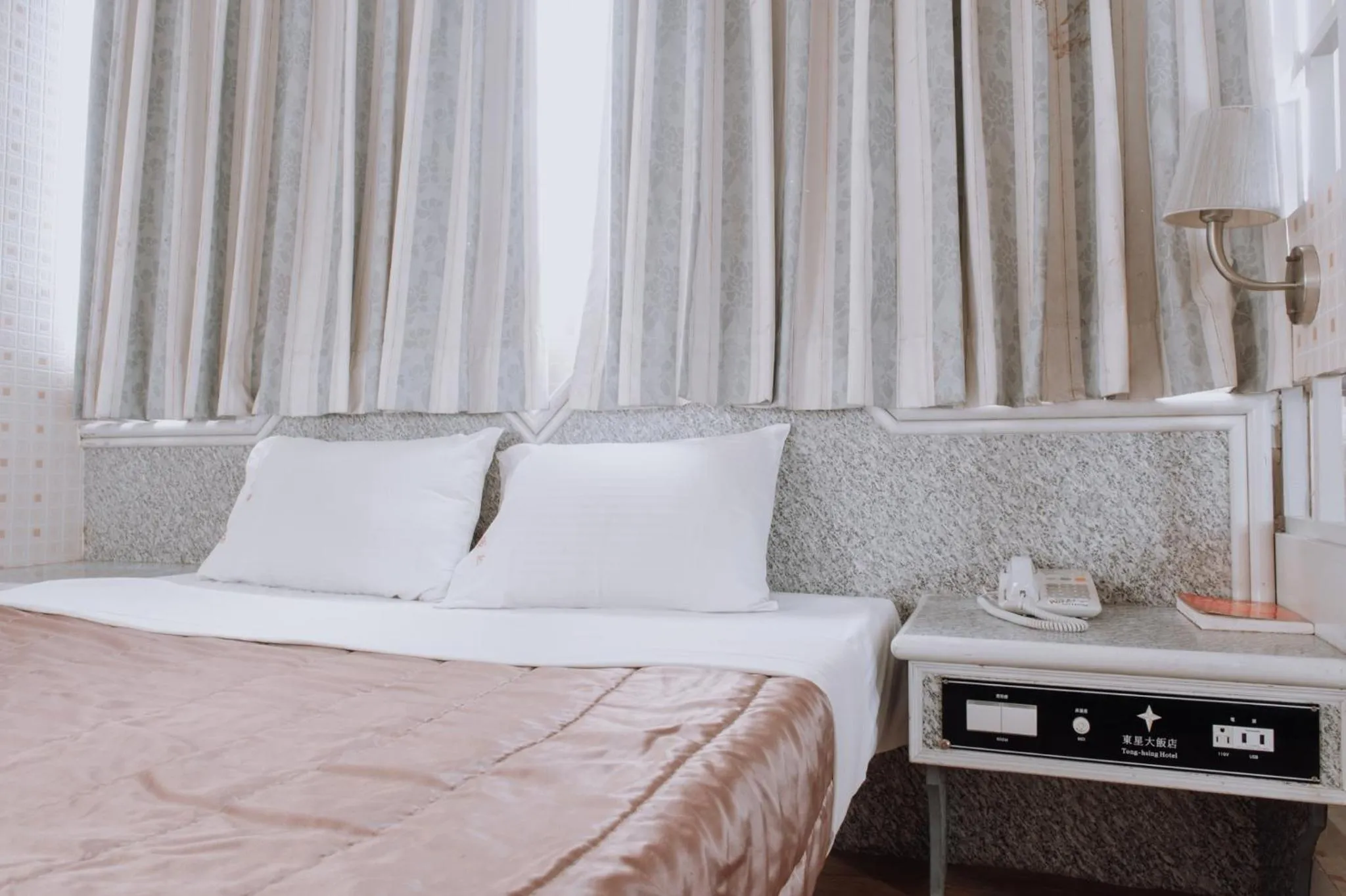 Bed in Tong Hsin Hotel