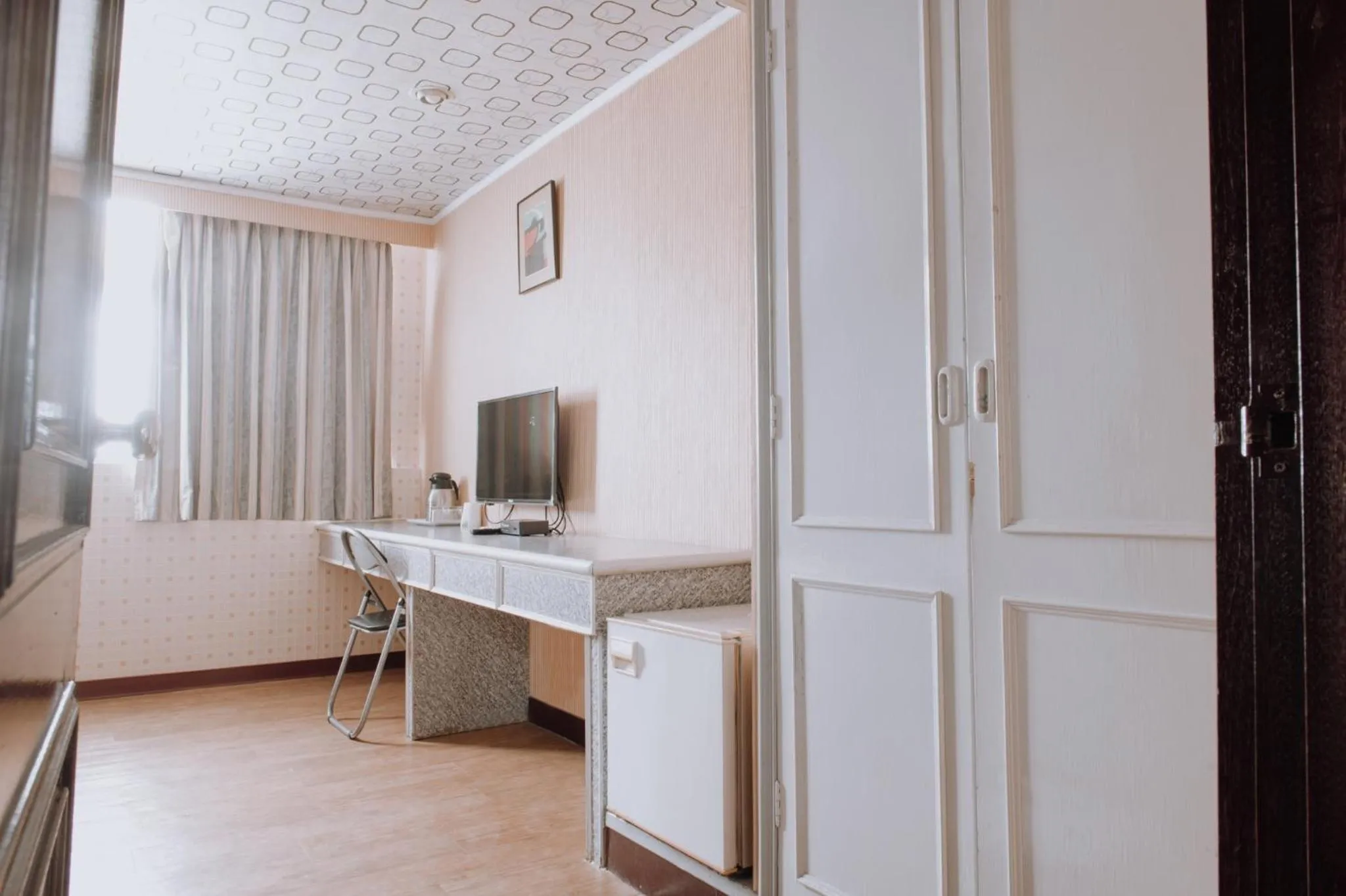 Bed in Tong Hsin Hotel