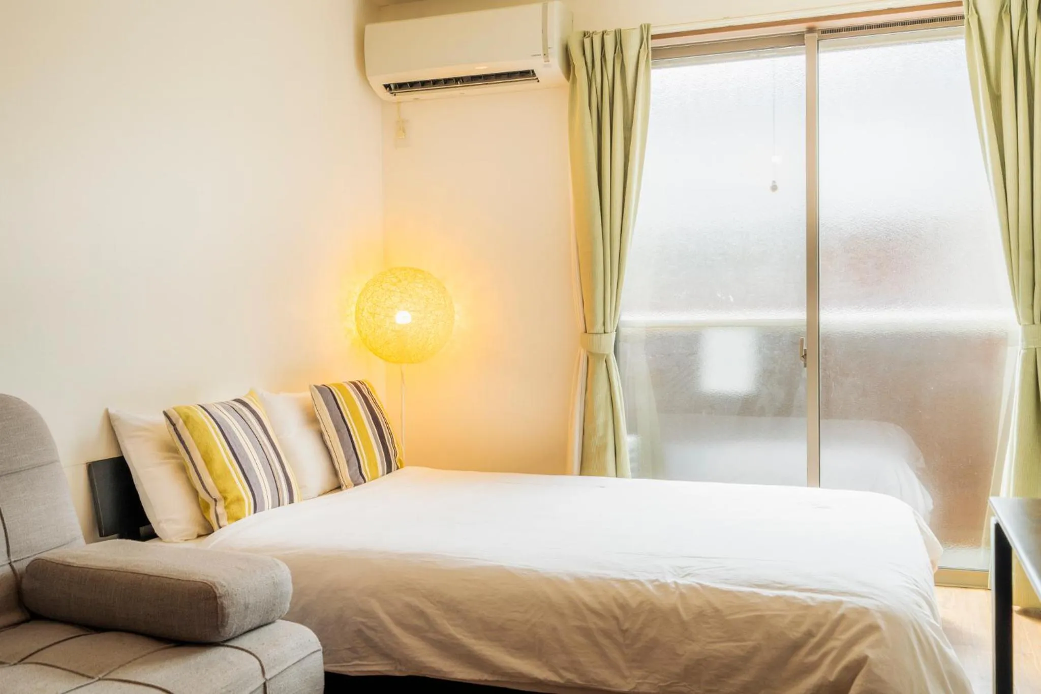 Bed in Apartment Hotel KANSO